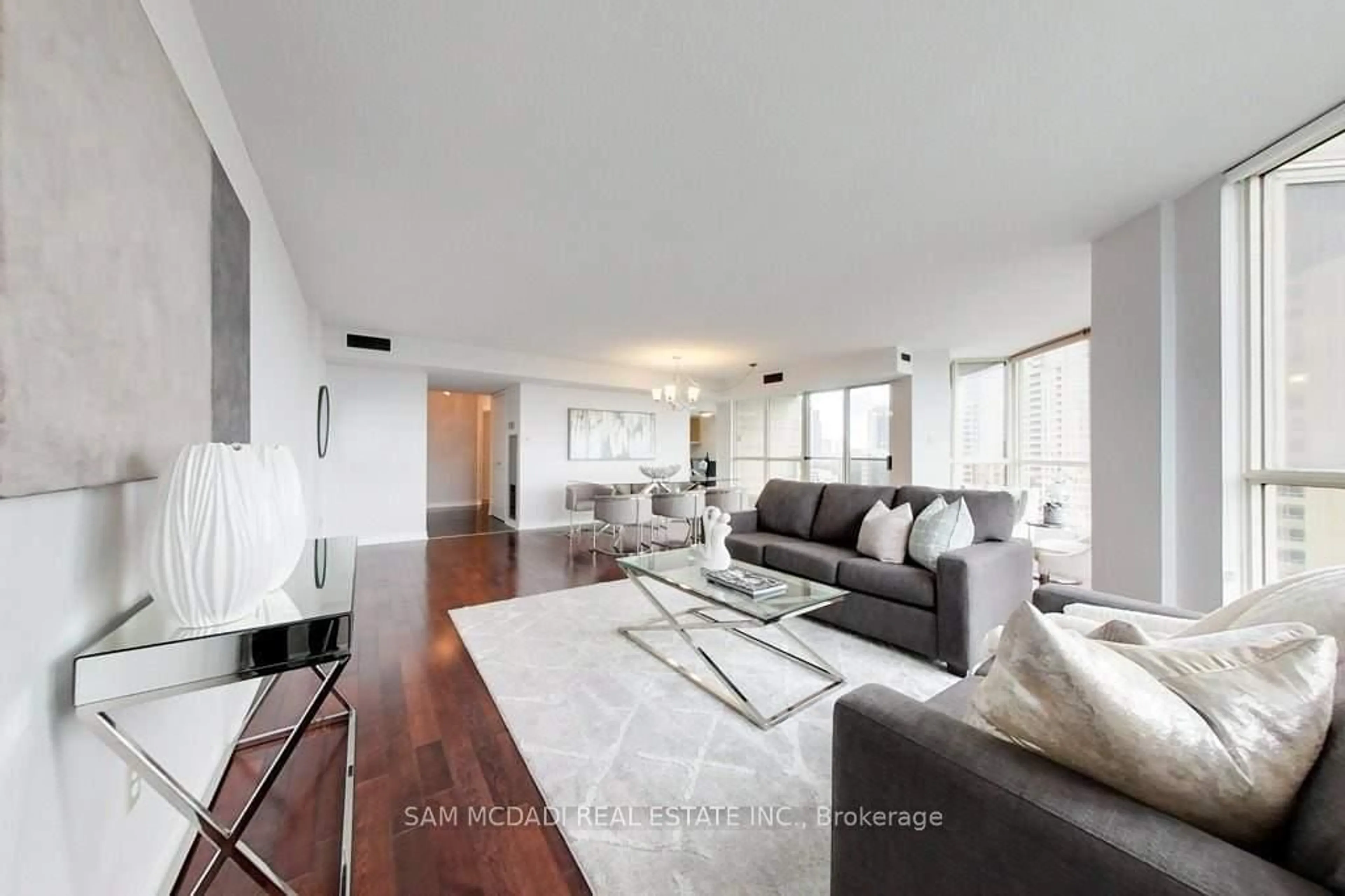 Living room with furniture, unknown for 55 Kingsbridge Garden Circ #1411, Mississauga Ontario L5R 1Y1