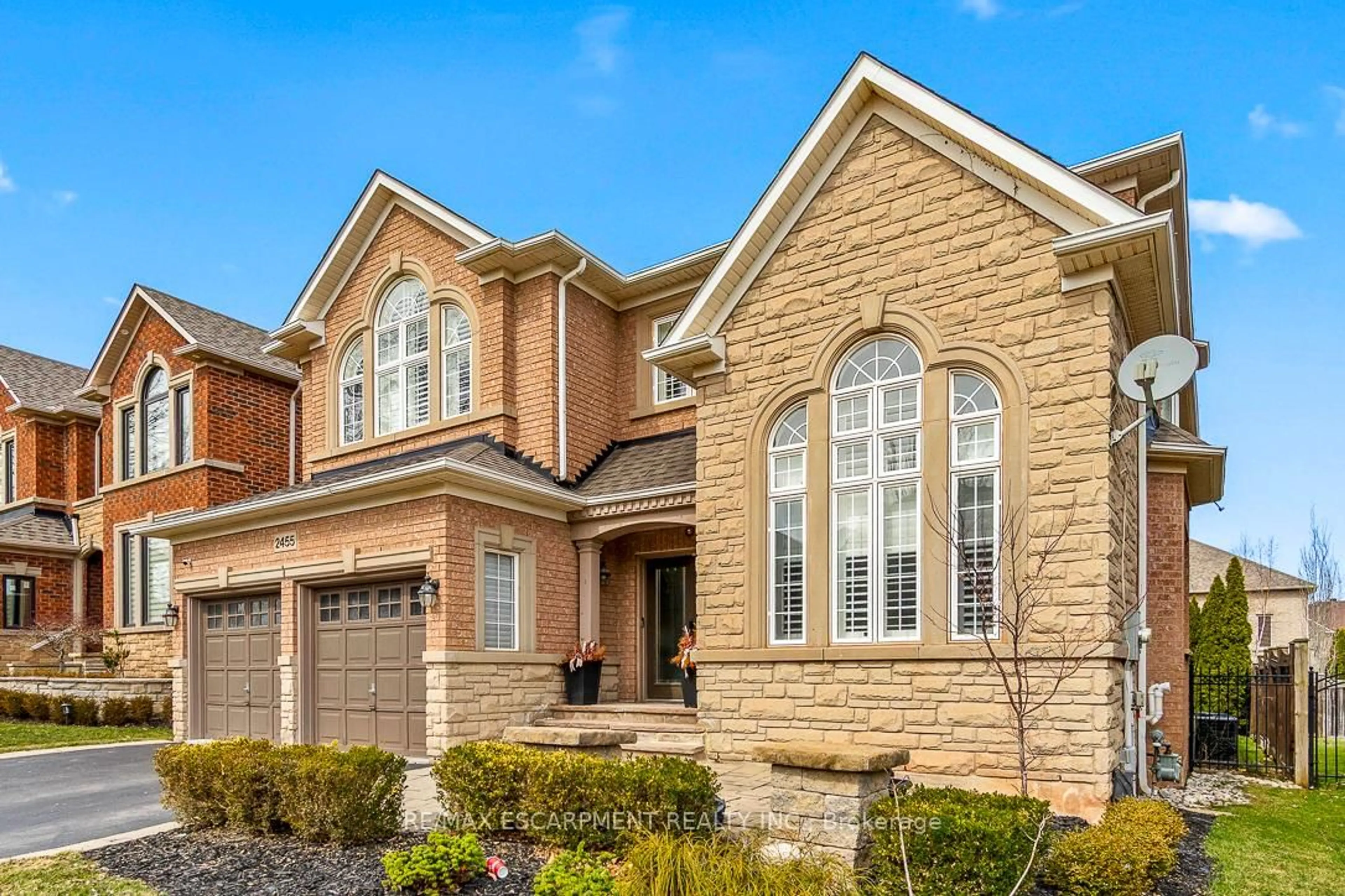 Home with brick exterior material, street for 2455 BON ECHO Dr, Oakville Ontario L6H 7R1