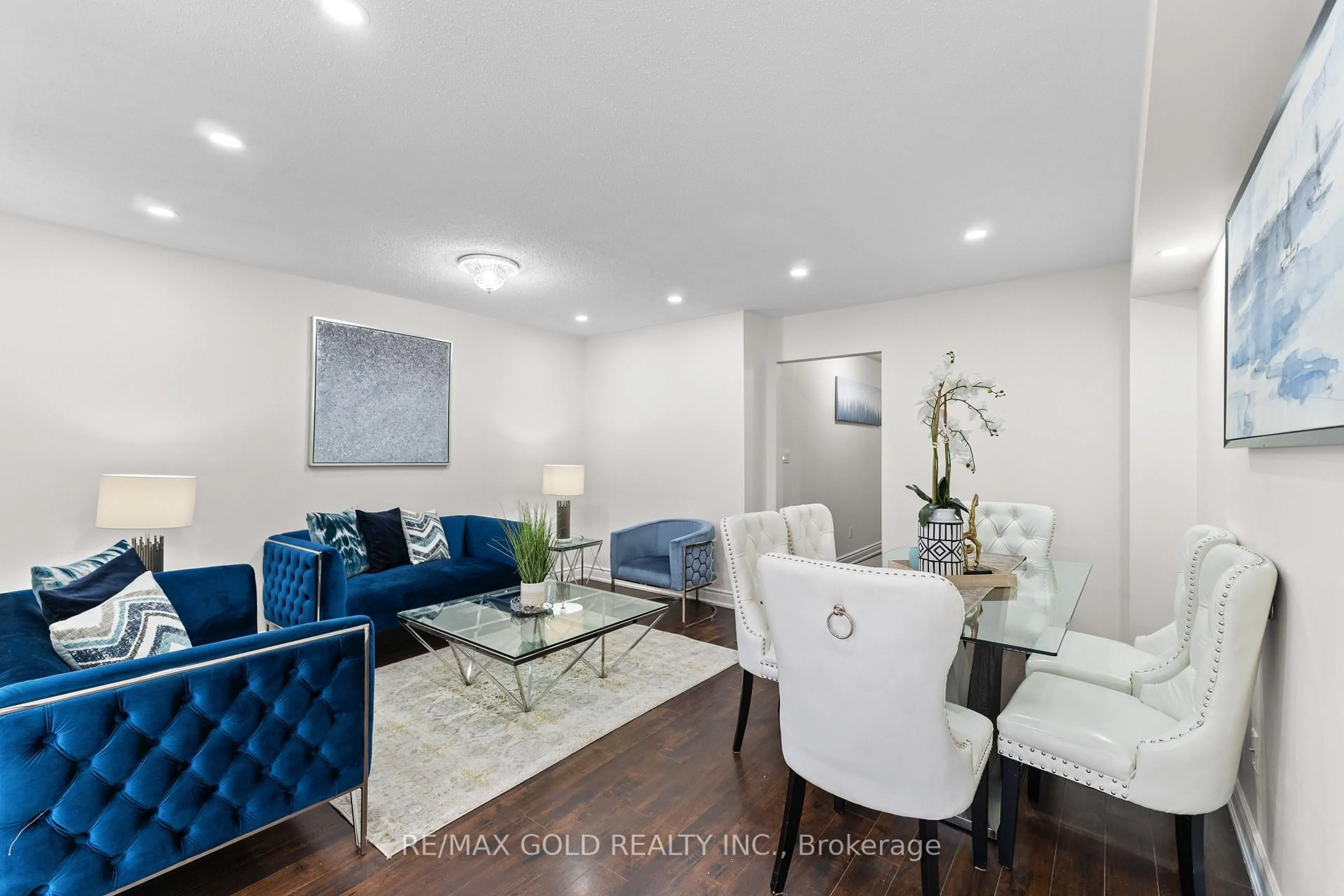 Living room with furniture, wood/laminate floor for 57 Teal Crest Circ, Brampton Ontario L6X 2Z5
