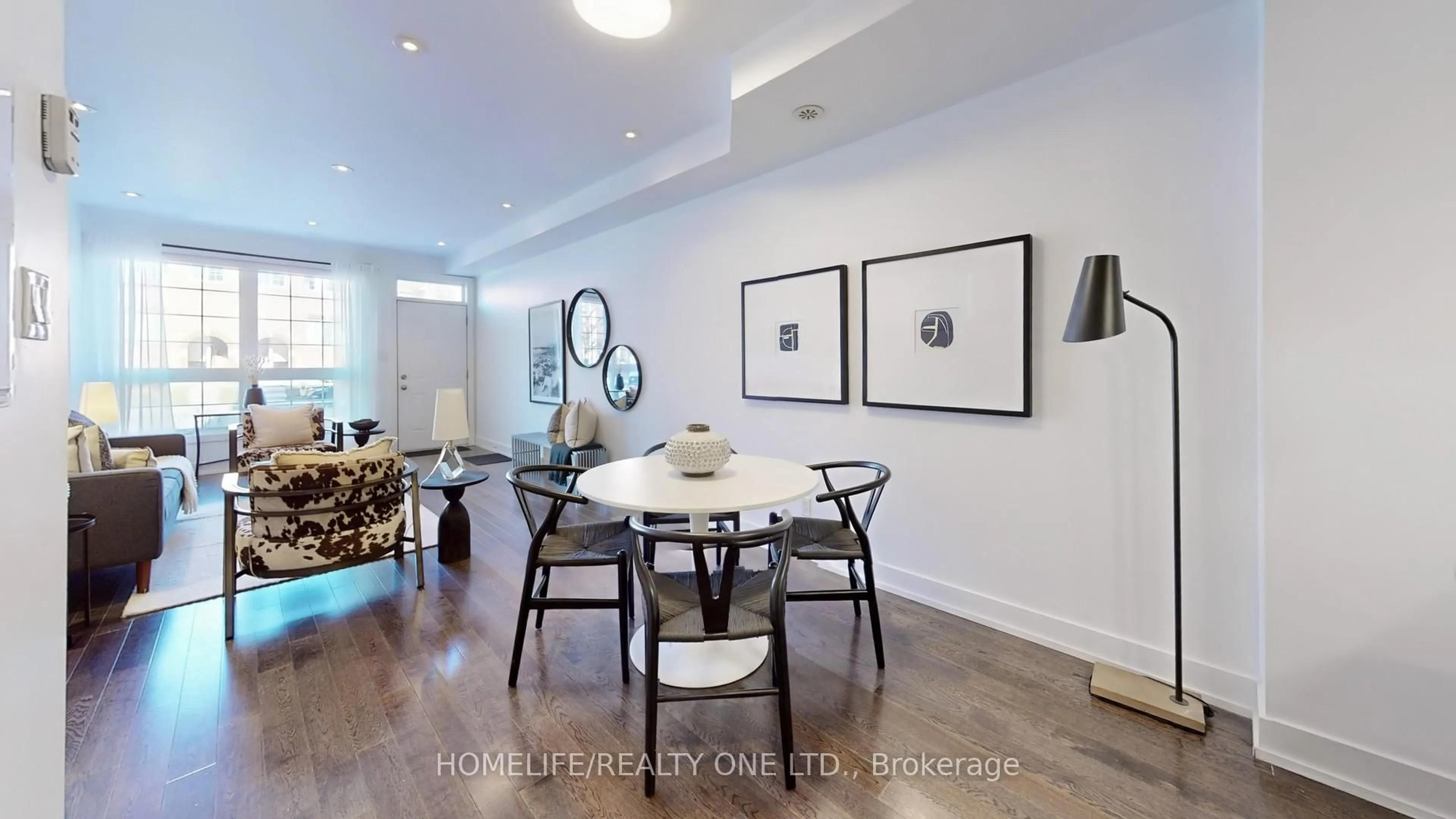 Dining room, wood/laminate floor for 1072 Lansdowne Ave, Toronto Ontario M6H 4H2