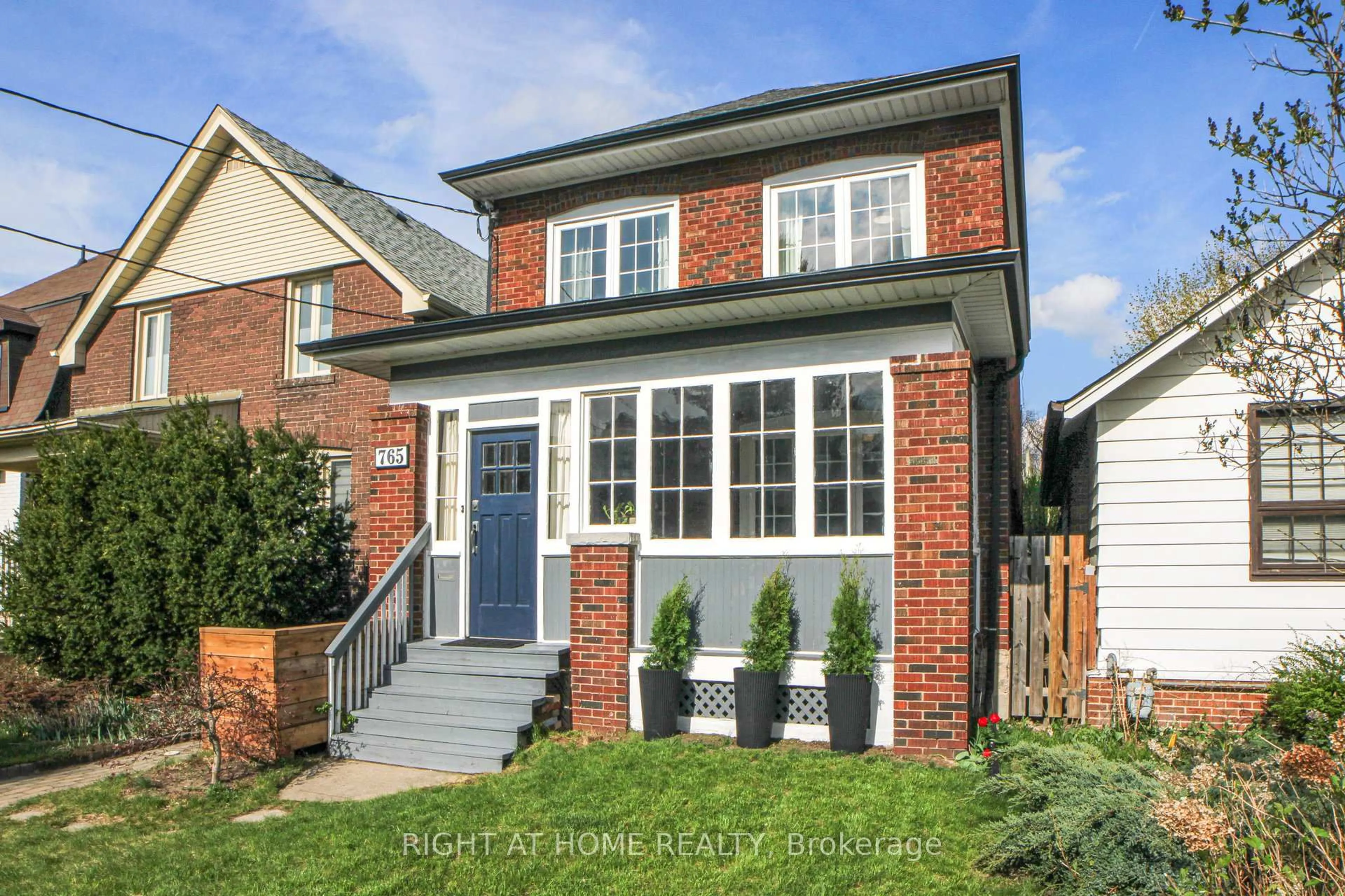 Home with brick exterior material, street for 765 Windermere Ave, Toronto Ontario M6S 3M5
