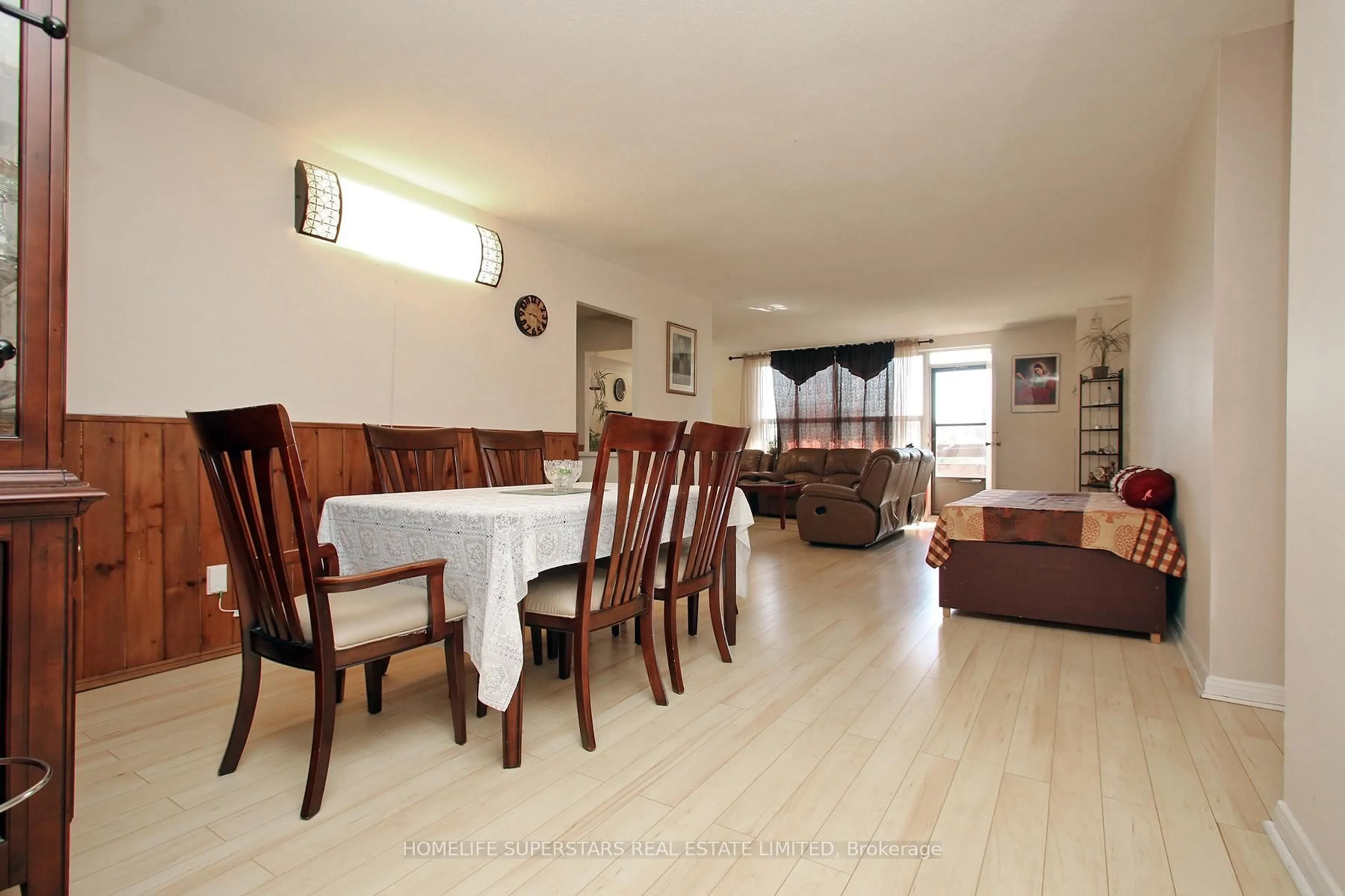 Dining room, wood/laminate floor for 45 Silverstone Dr #307, Toronto Ontario M9V 4B1