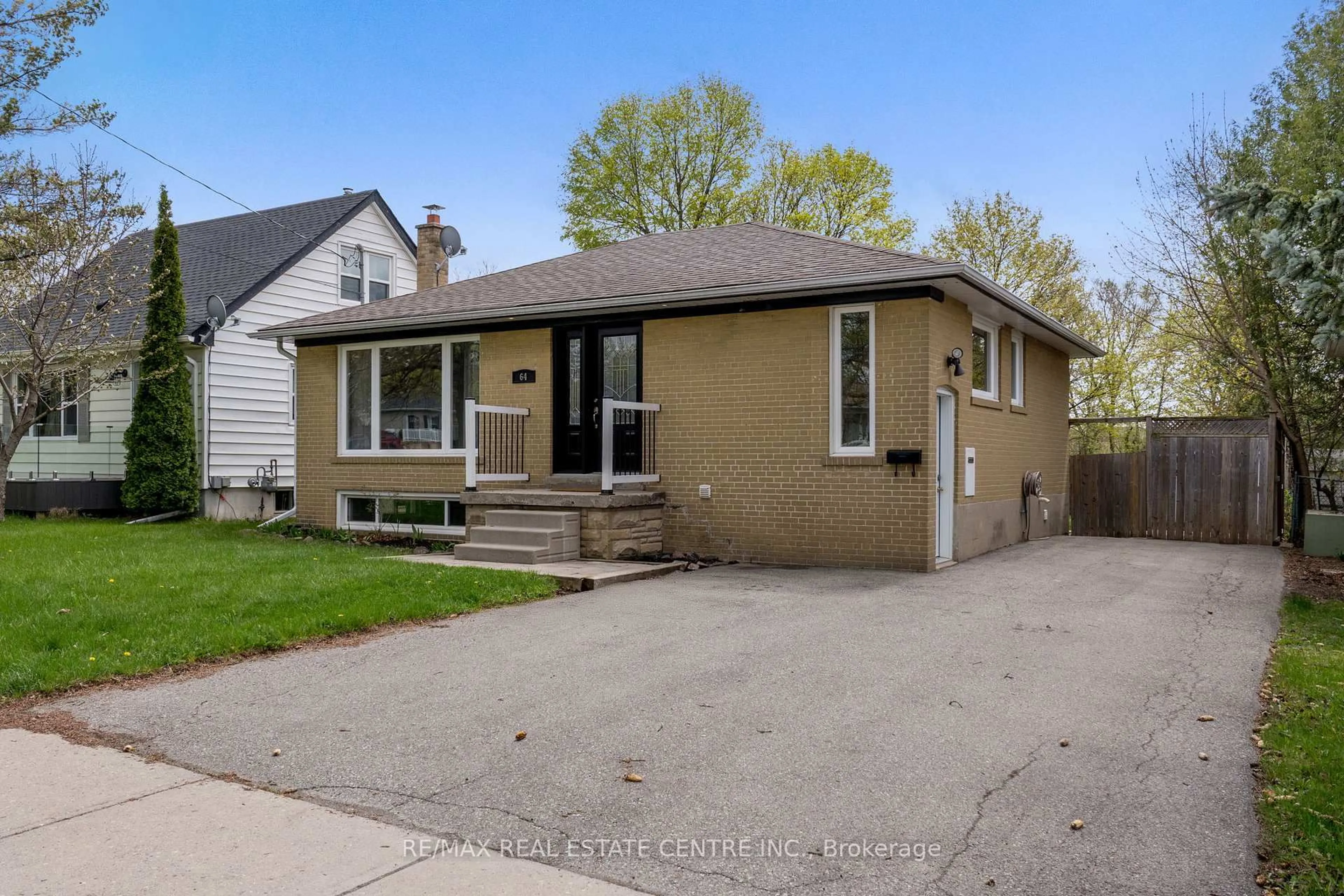 Home with vinyl exterior material, street for 64 Prince Charles Dr, Halton Hills Ontario L7G 3V3