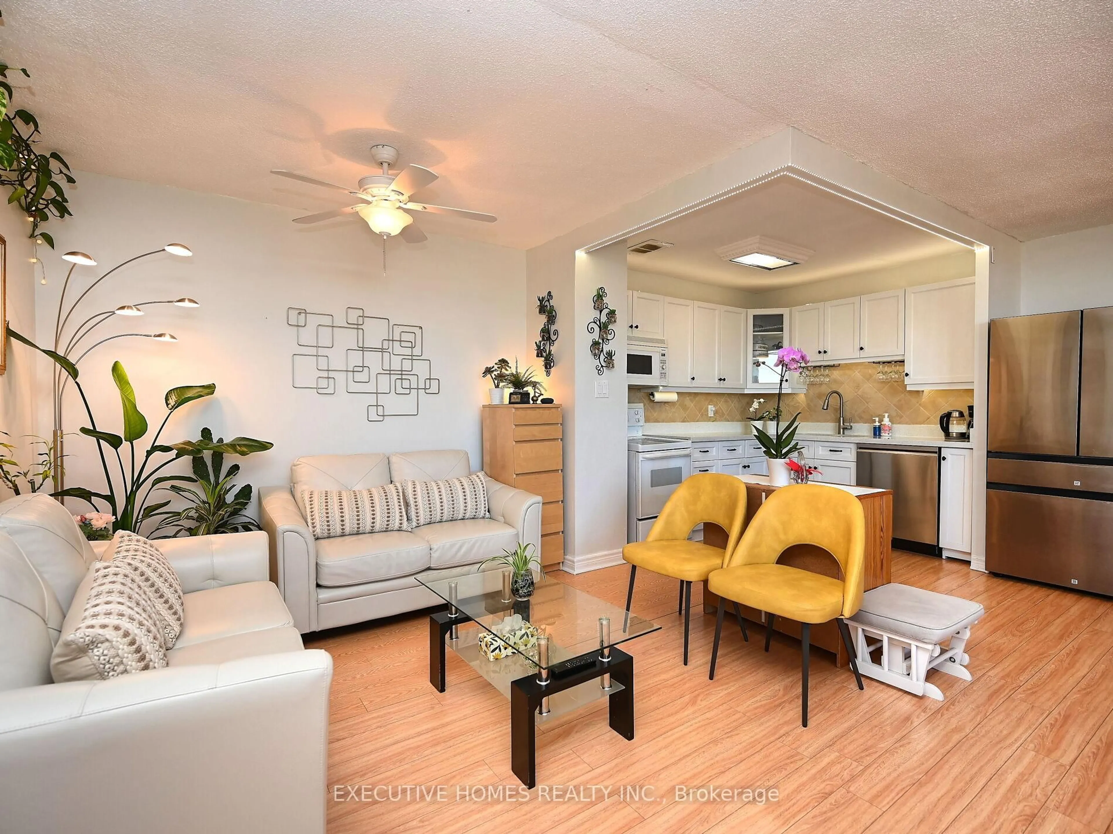 Living room with furniture, unknown for 3065 Queen Frederica Dr #1107, Mississauga Ontario L4Y 3A3