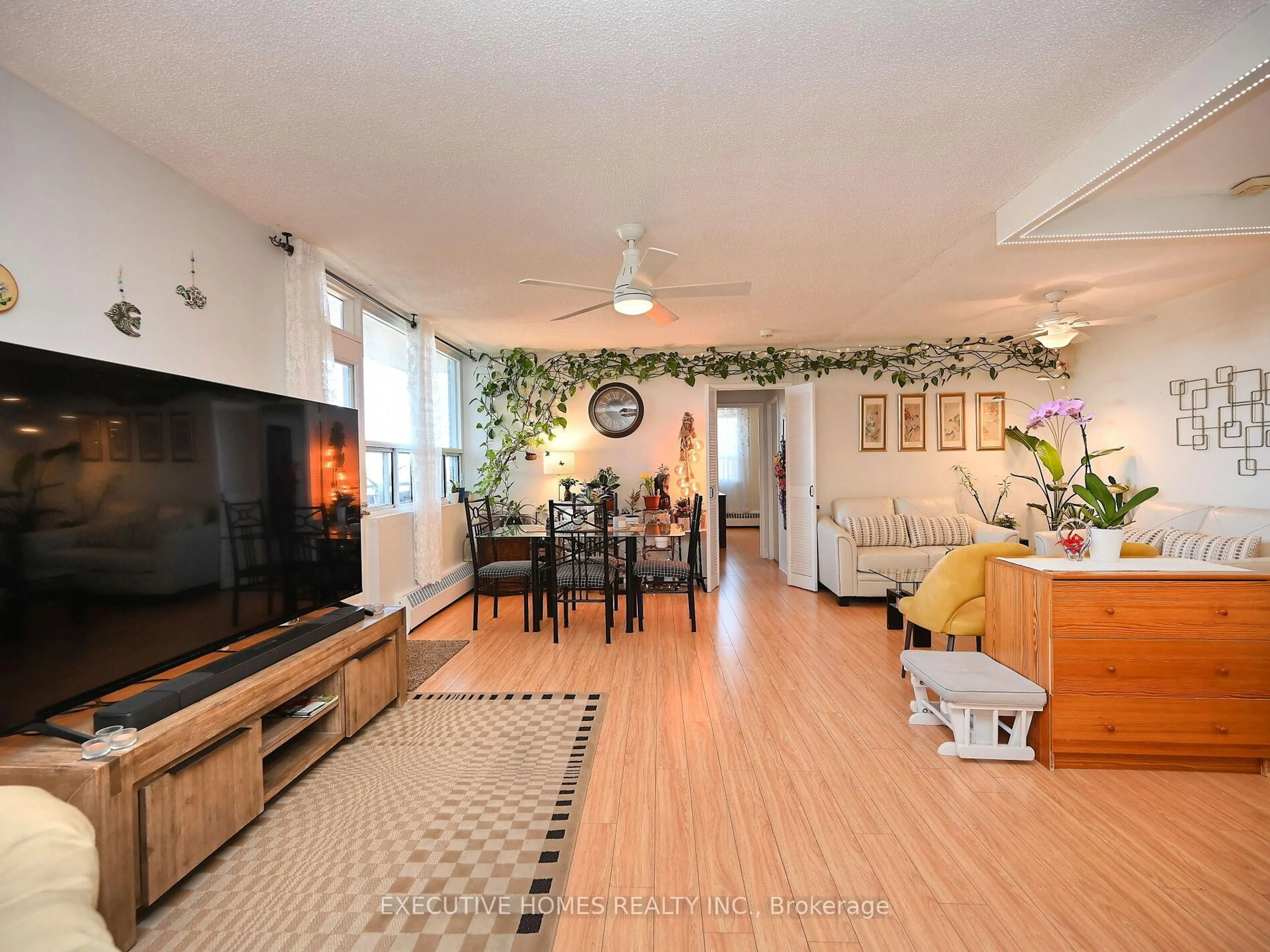 Living room with furniture, unknown for 3065 Queen Frederica Dr #1107, Mississauga Ontario L4Y 3A3