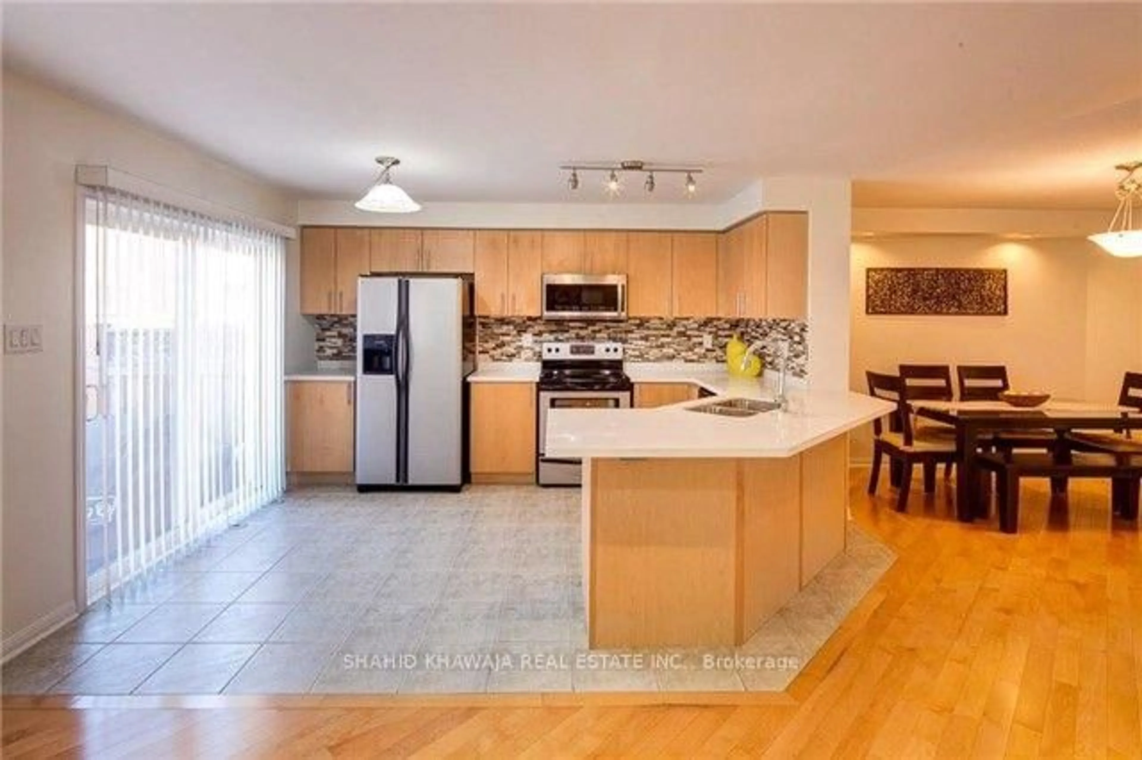 Open concept kitchen, ceramic/tile floor for 841 Gifford Cres, Milton Ontario L9T 0L2