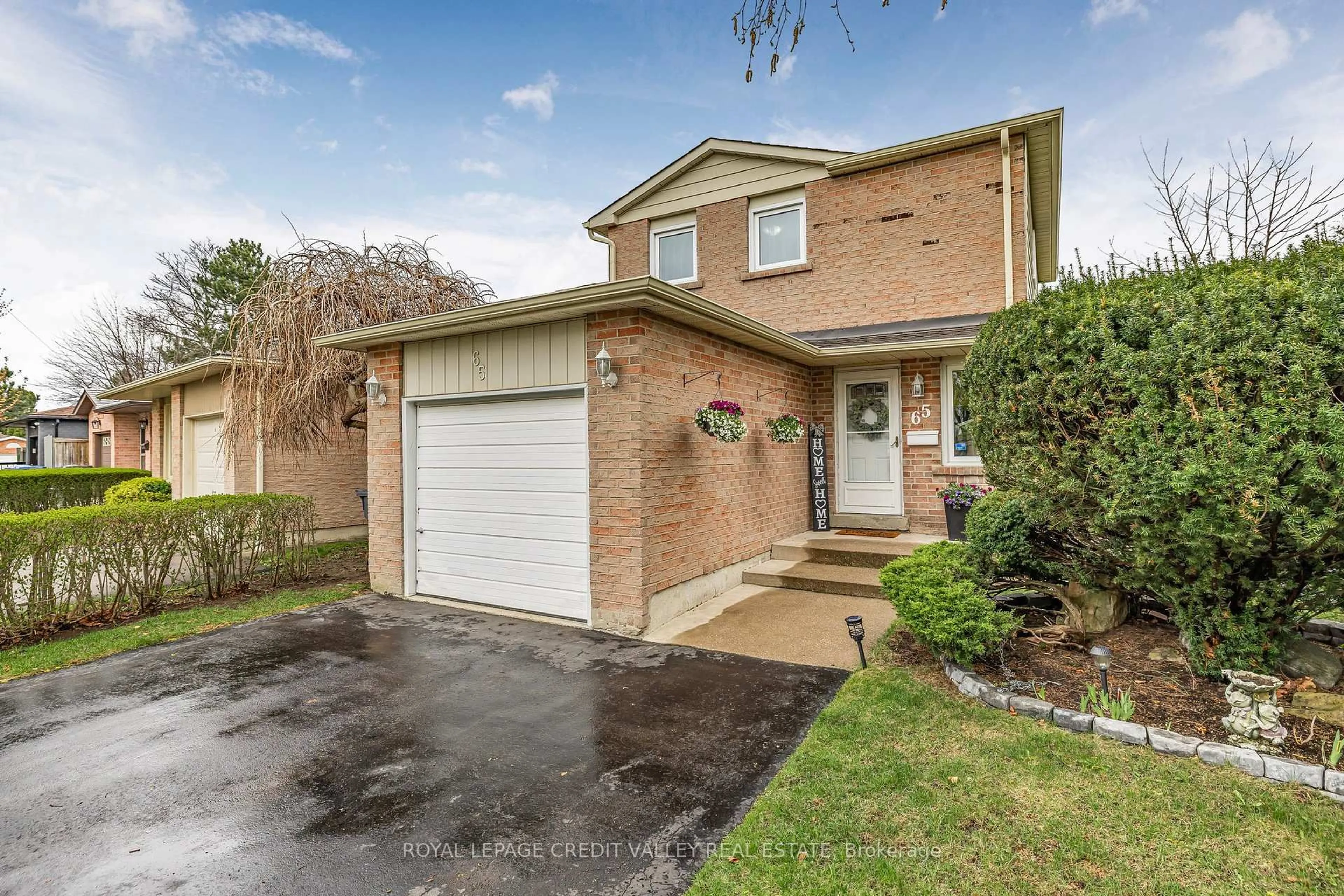 Home with brick exterior material, street for 65 Martindale Cres, Brampton Ontario L6X 2V7
