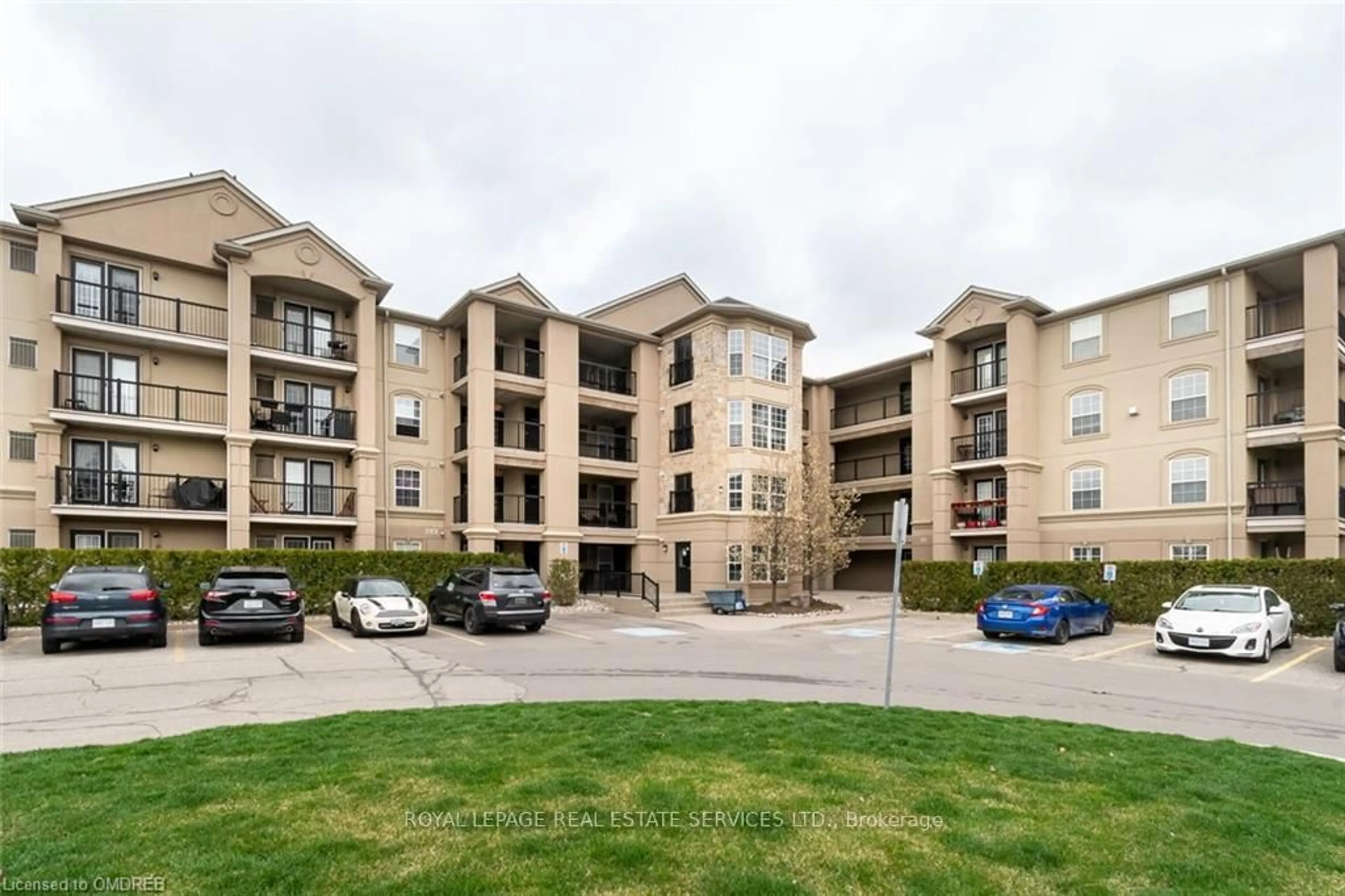 A pic from outside/outdoor area/front of a property/back of a property/a pic from drone, unknown for 1483 Maple Ave #409, Milton Ontario L9T 0B6