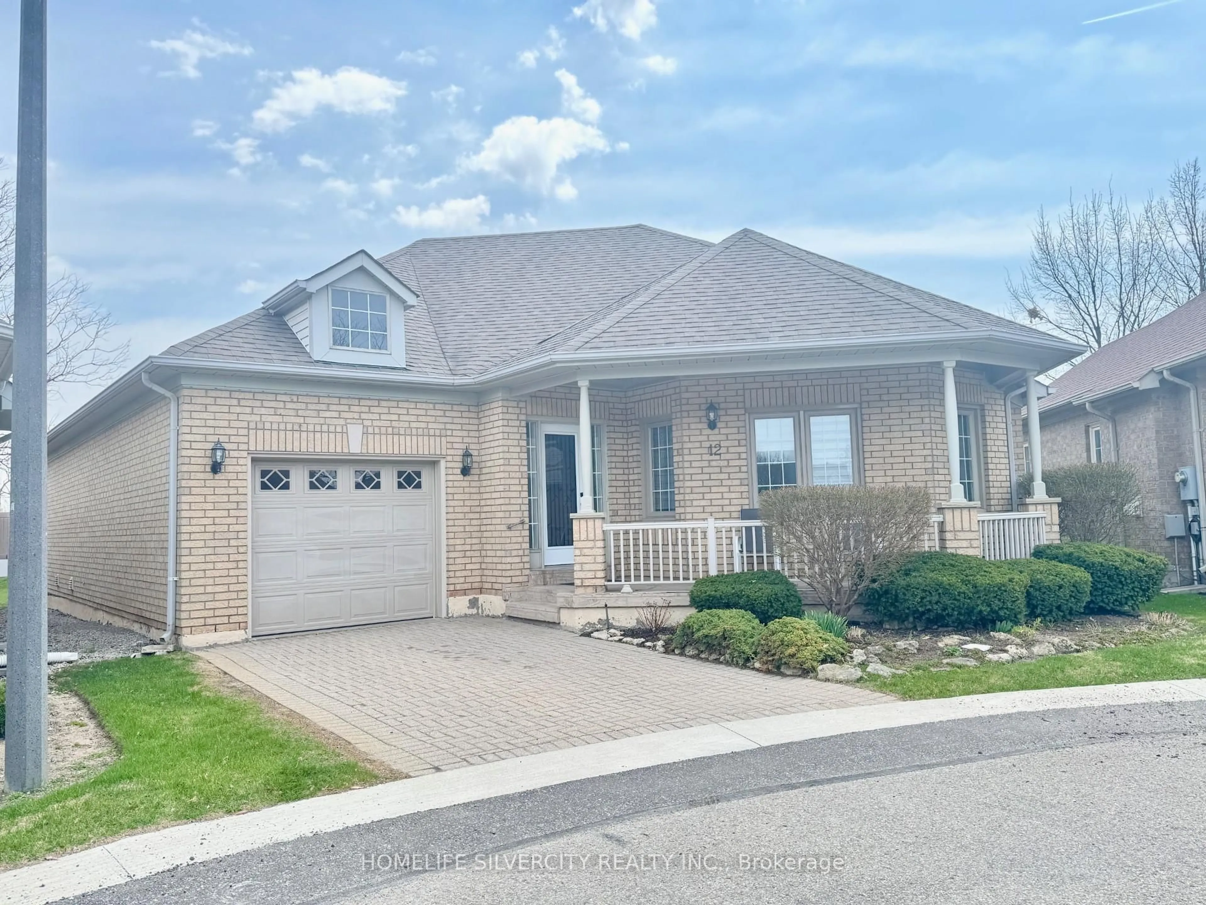 Home with brick exterior material, street for 12 Larkdale Terr, Brampton Ontario L6R 1W5