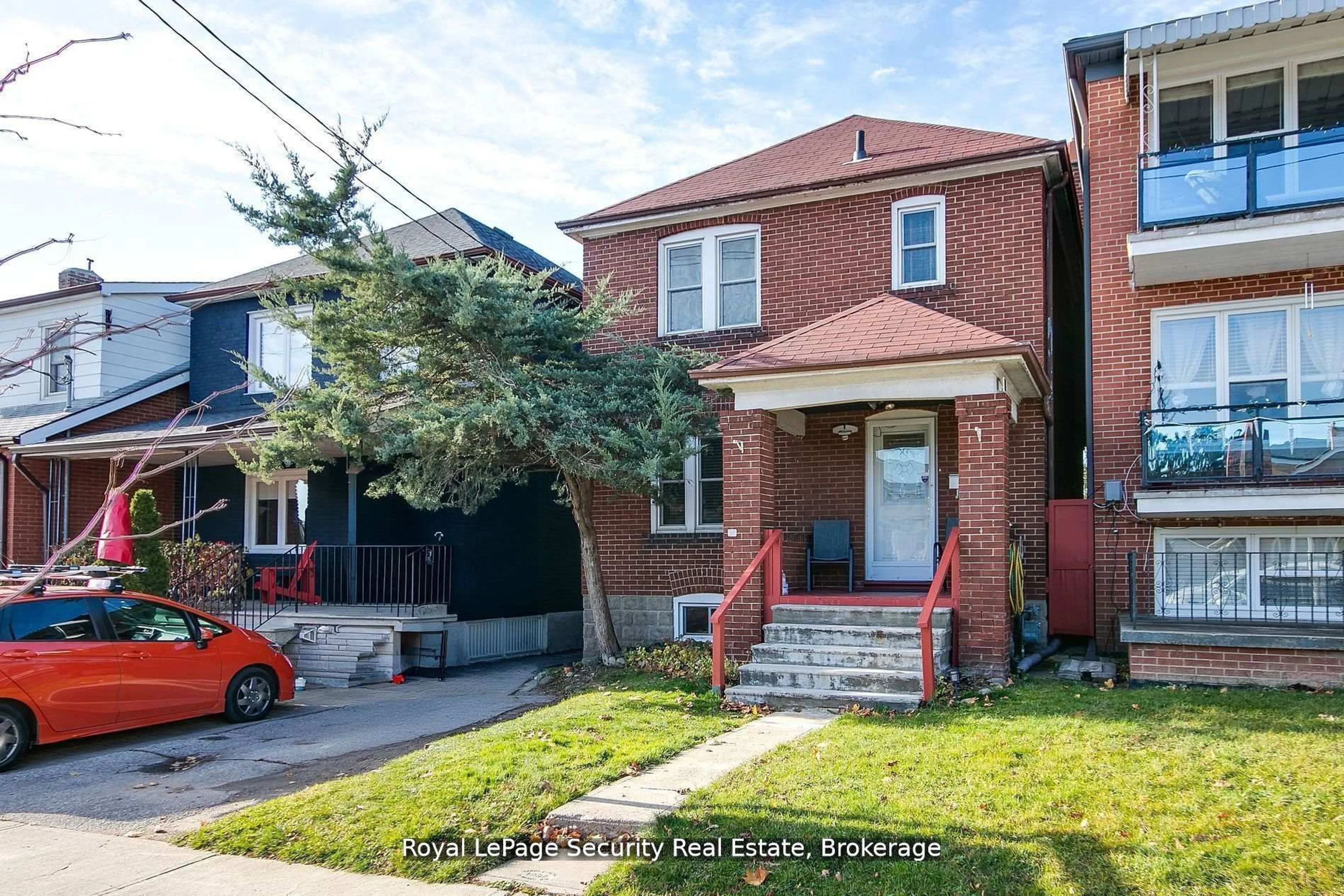 Home with brick exterior material, street for 94 Fairbank Ave, Toronto Ontario M6E 3Y7
