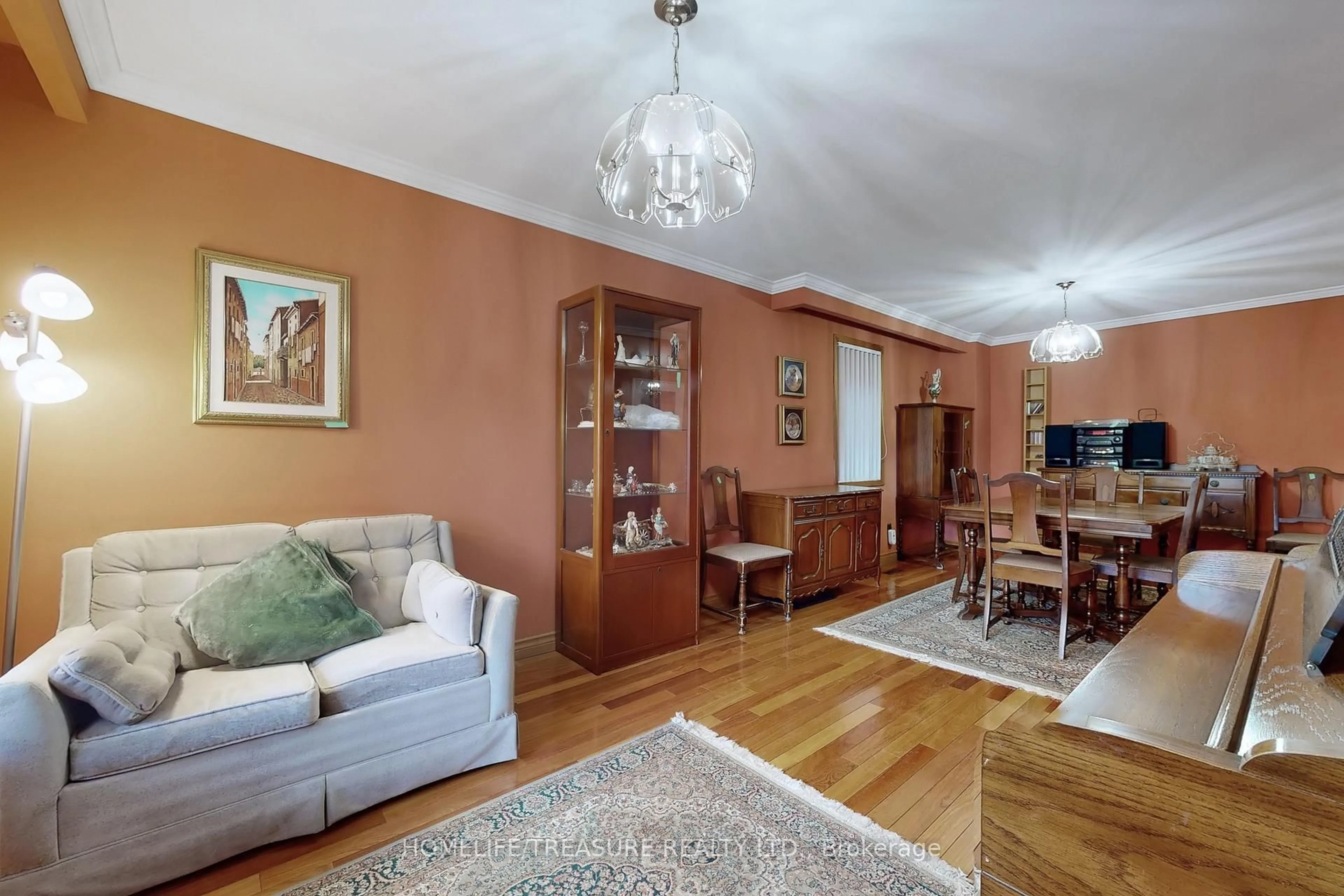 Living room with furniture, wood/laminate floor for 44 Grandville Ave, Toronto Ontario M6N 4T9