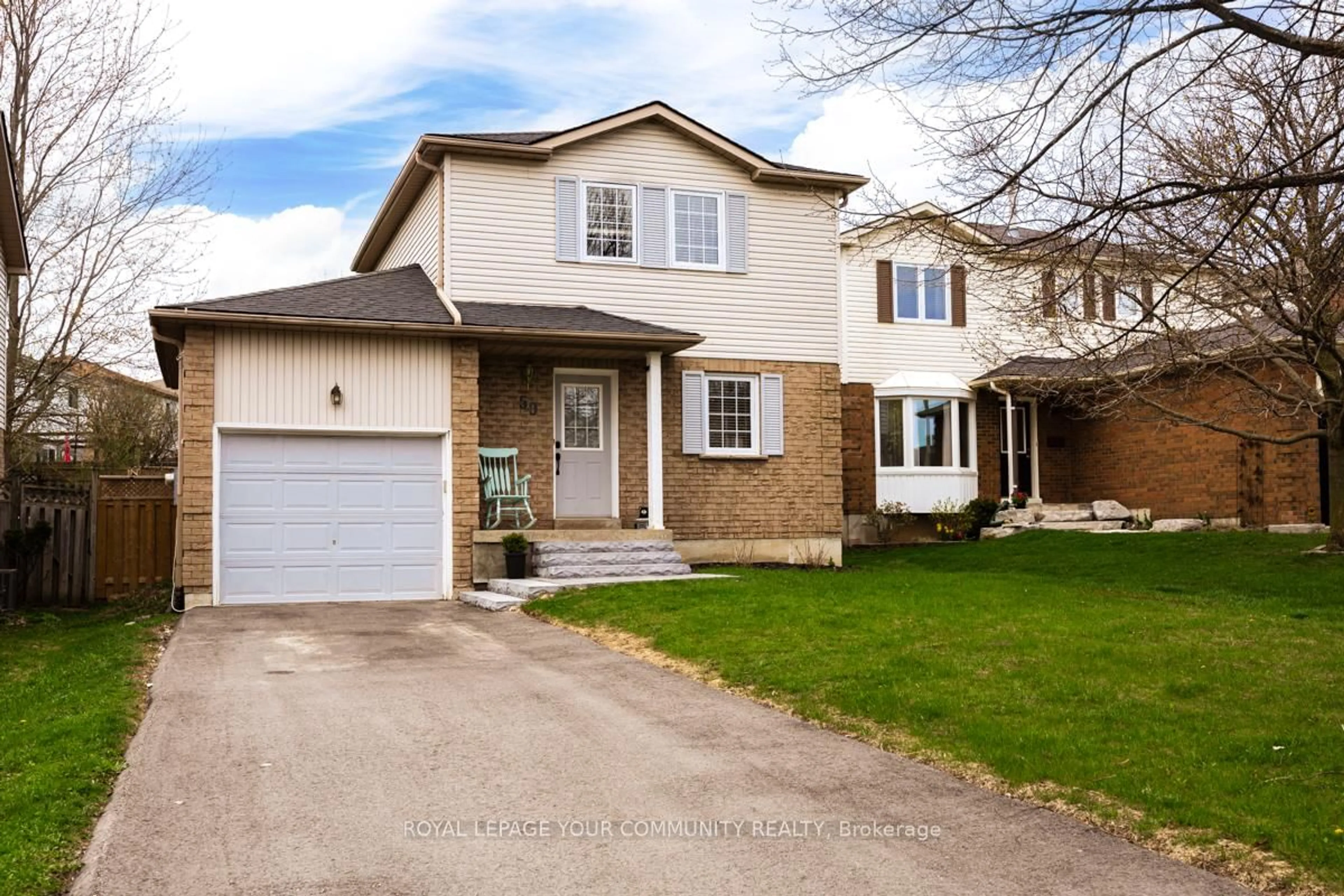 Home with vinyl exterior material, street for 50 Fieldgate Dr, Orangeville Ontario L9W 4R9