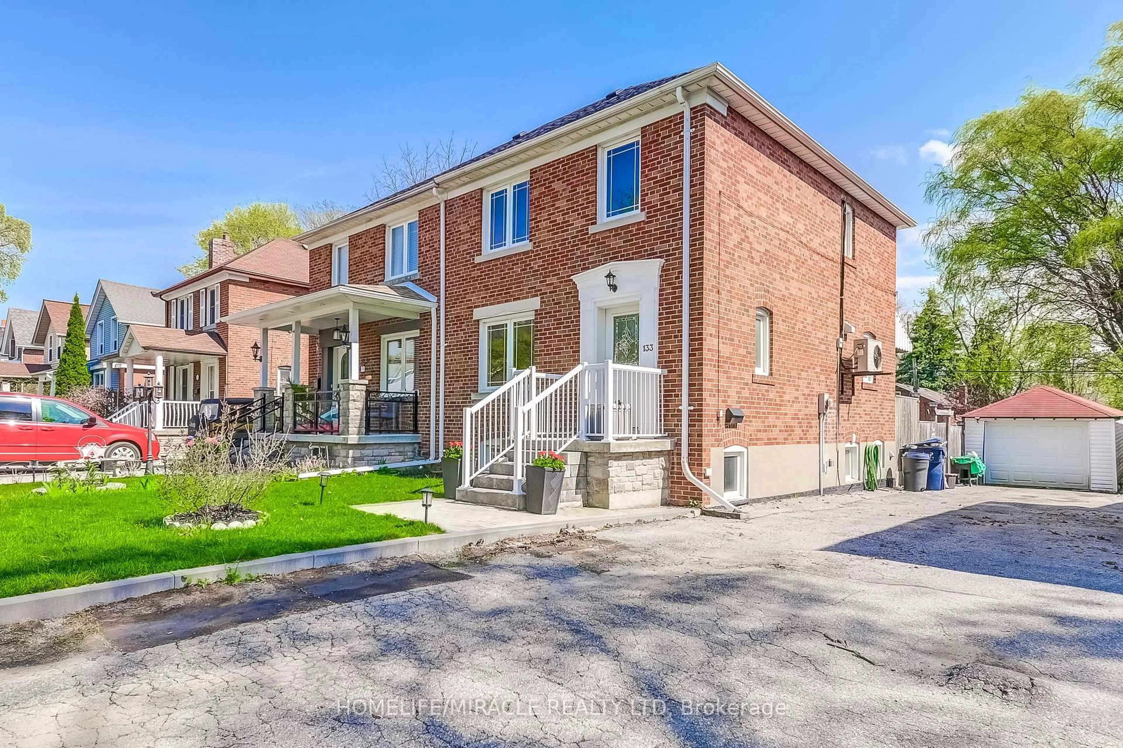Home with brick exterior material, street for 133 Queens Dr, Toronto Ontario M9N 2H5