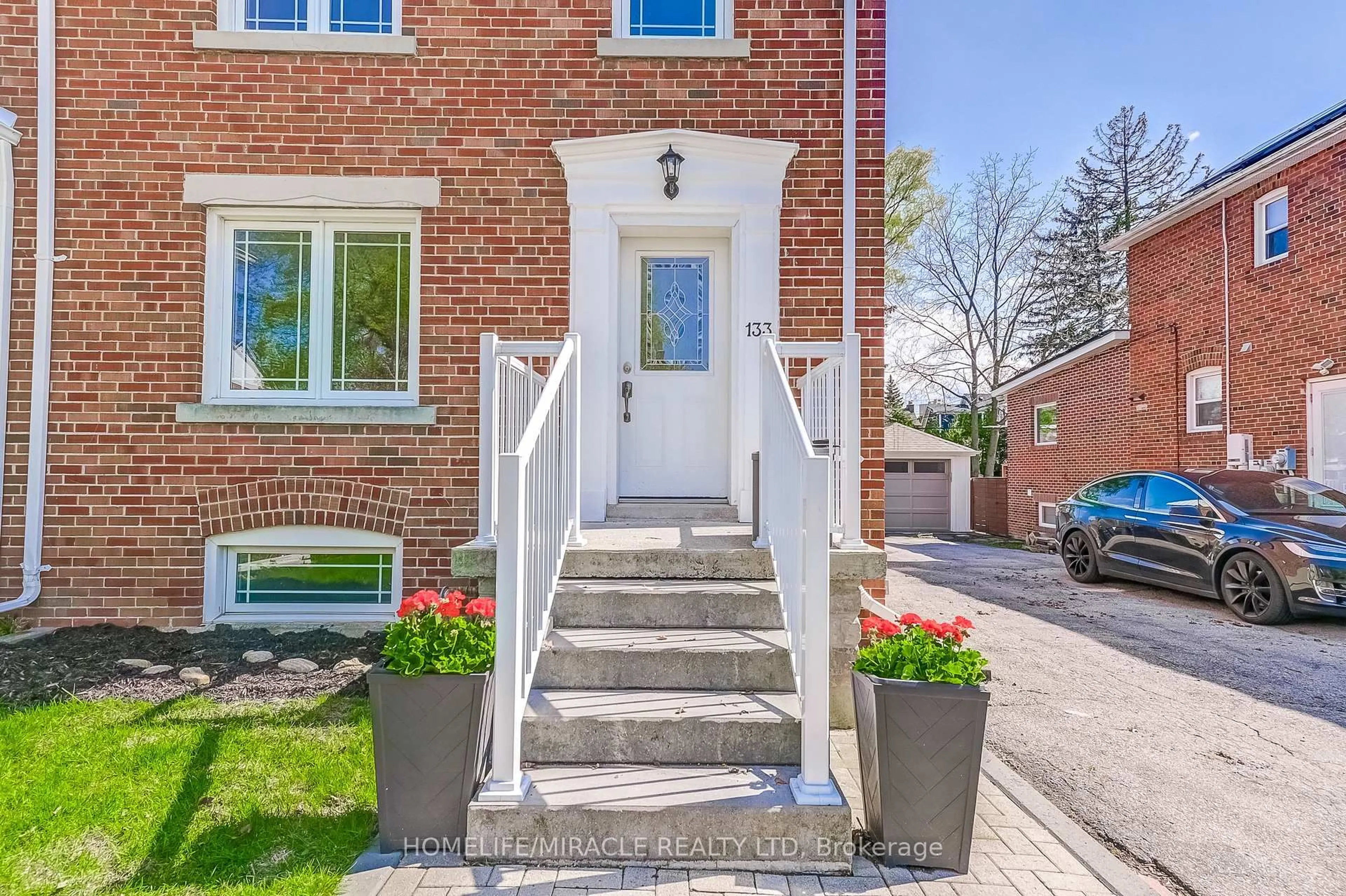 Home with brick exterior material, street for 133 Queens Dr, Toronto Ontario M9N 2H5