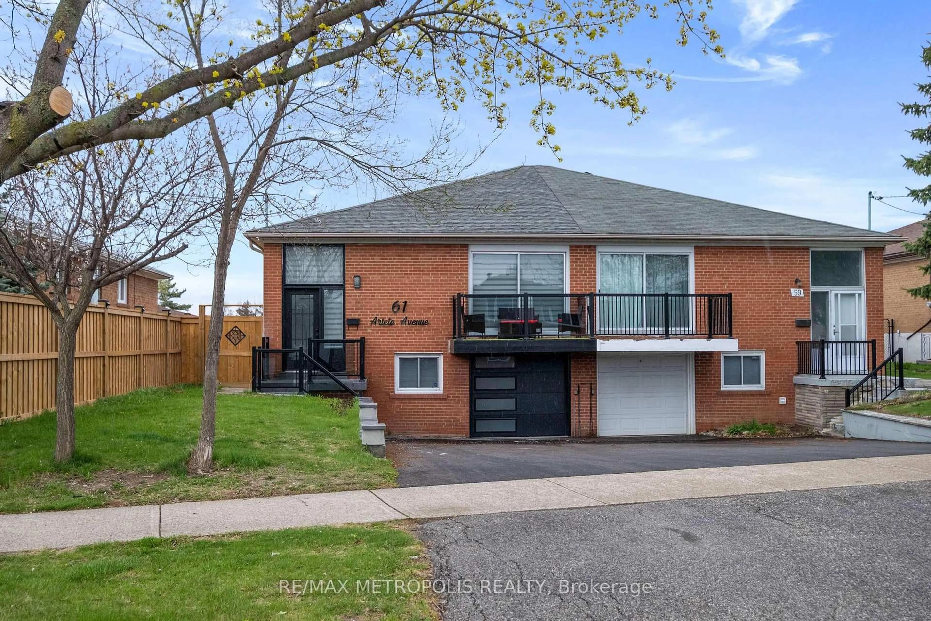 Home with brick exterior material, street for 61 ARLETA Ave, Toronto Ontario M3L 2E6