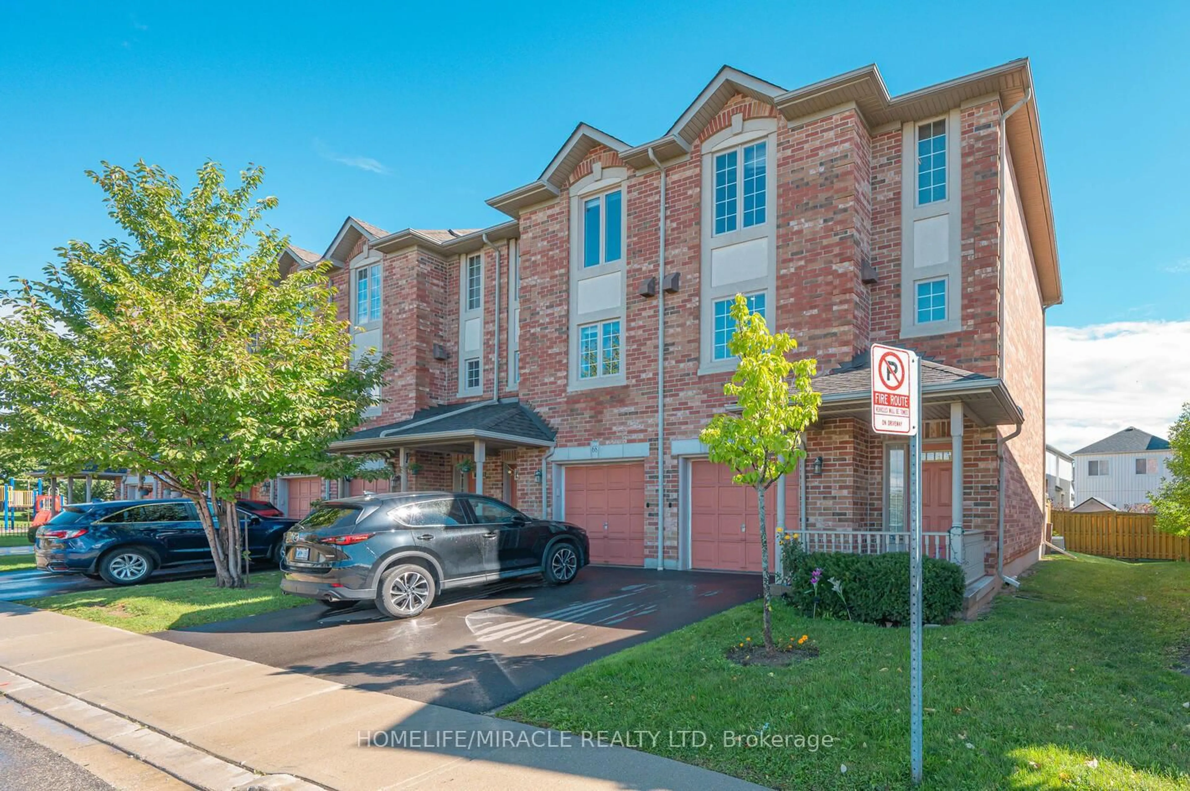 Home with brick exterior material, street for 7385 Magistrate Terr #66, Mississauga Ontario L5W 1W9