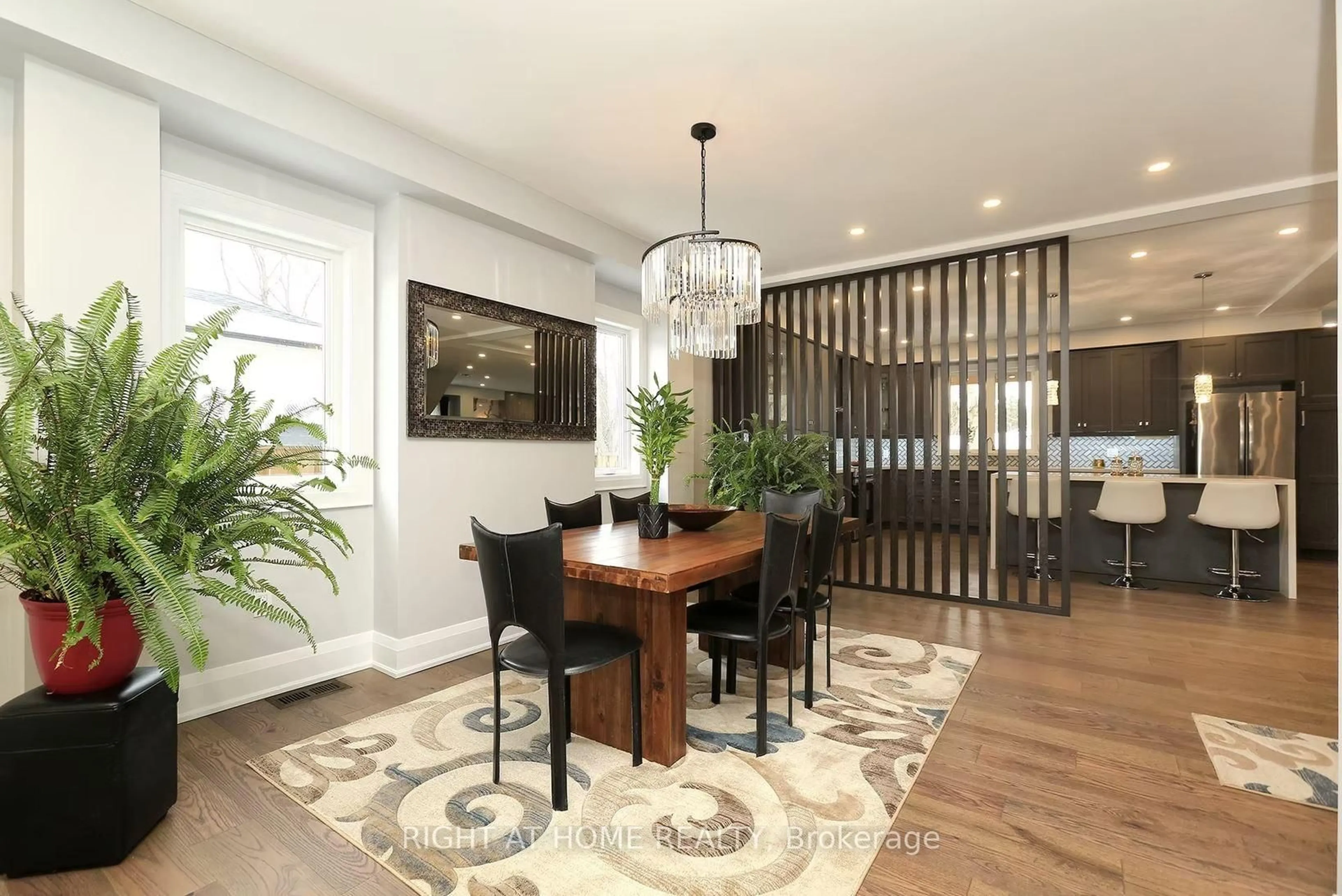 Dining room, wood/laminate floor for 35 Woodward Ave, Brampton Ontario L6V 1K2