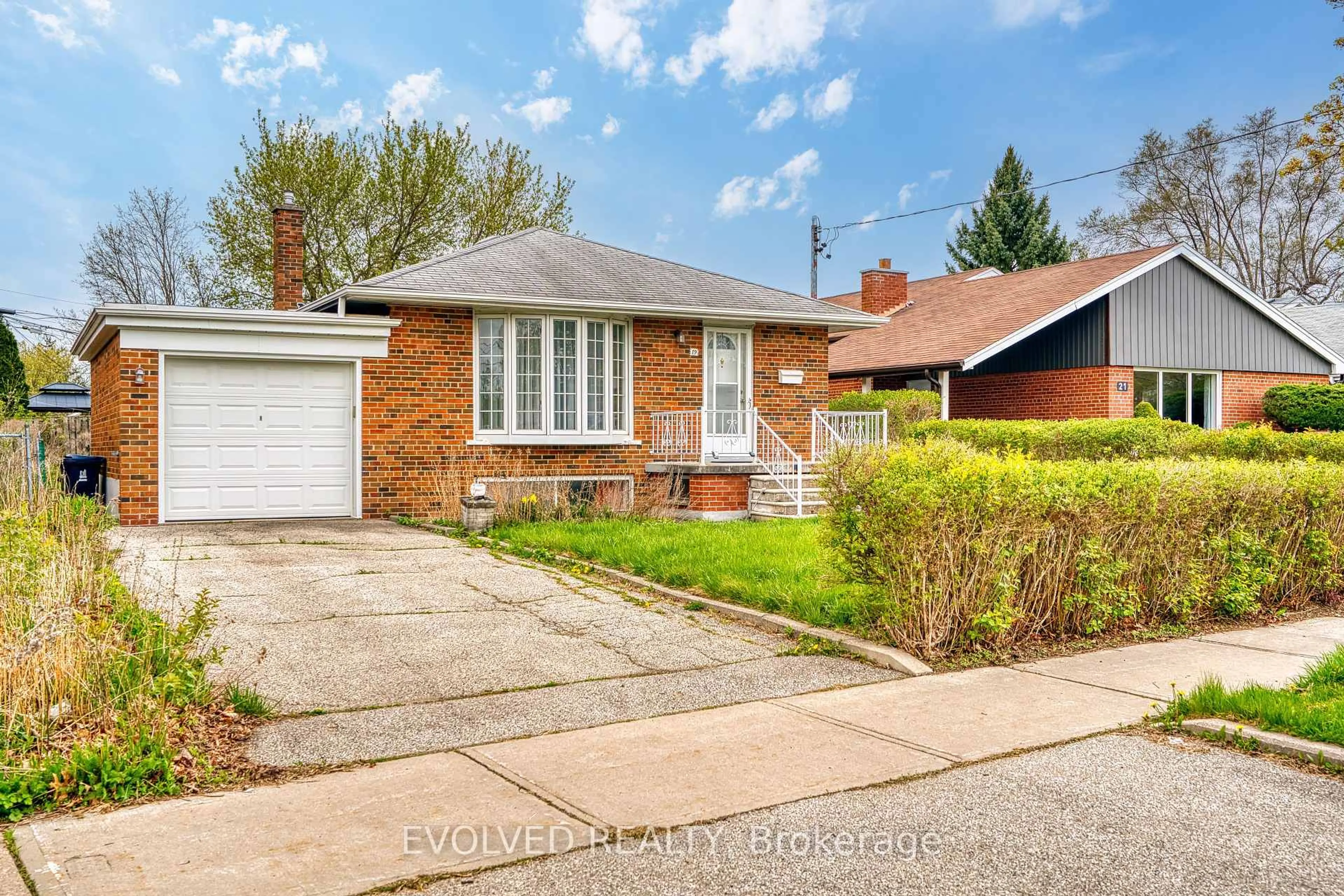 Home with brick exterior material, street for 19 Tayrow Rd, Toronto Ontario M9W 2T8