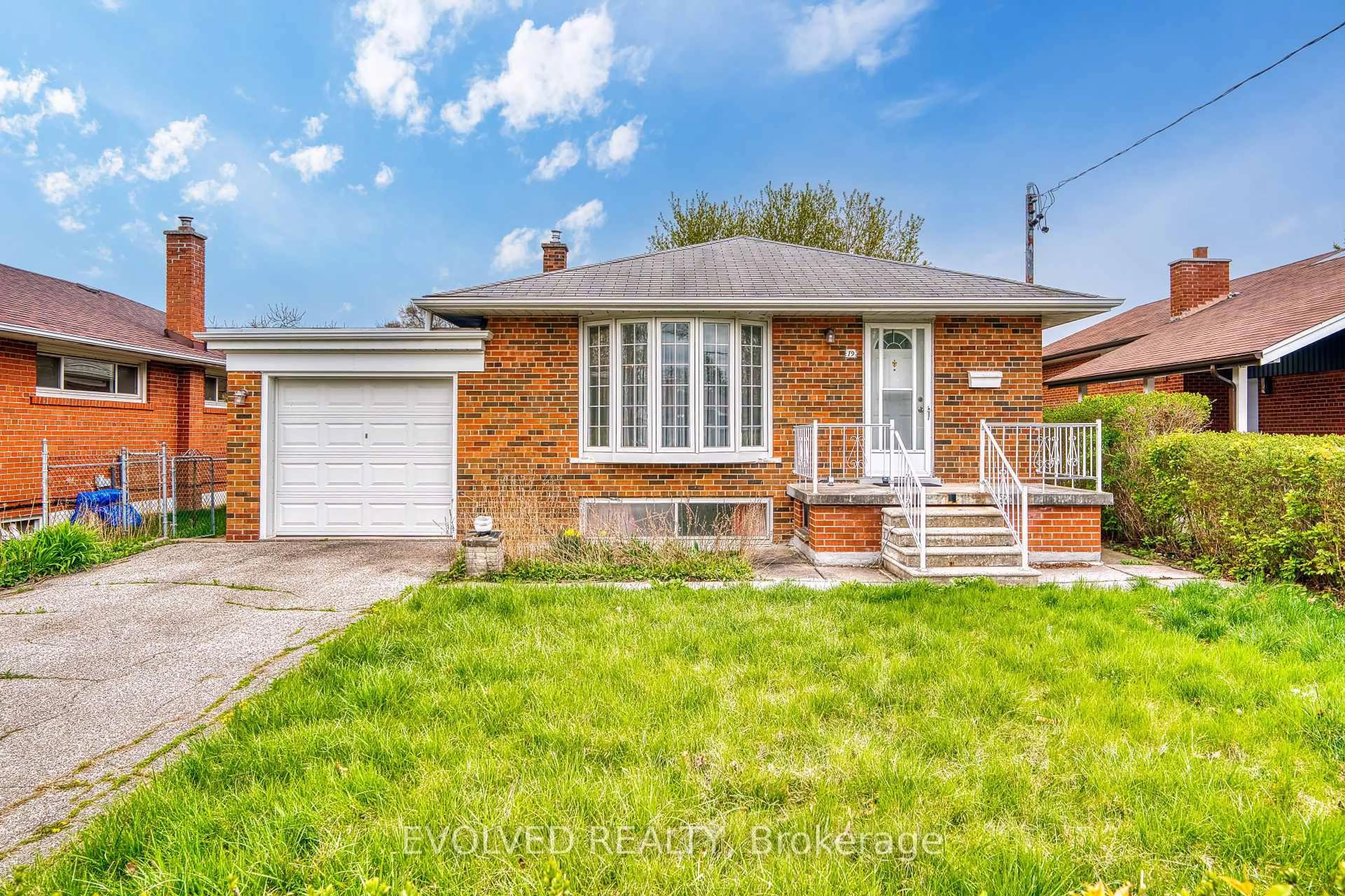 Home with brick exterior material, street for 19 Tayrow Rd, Toronto Ontario M9W 2T8