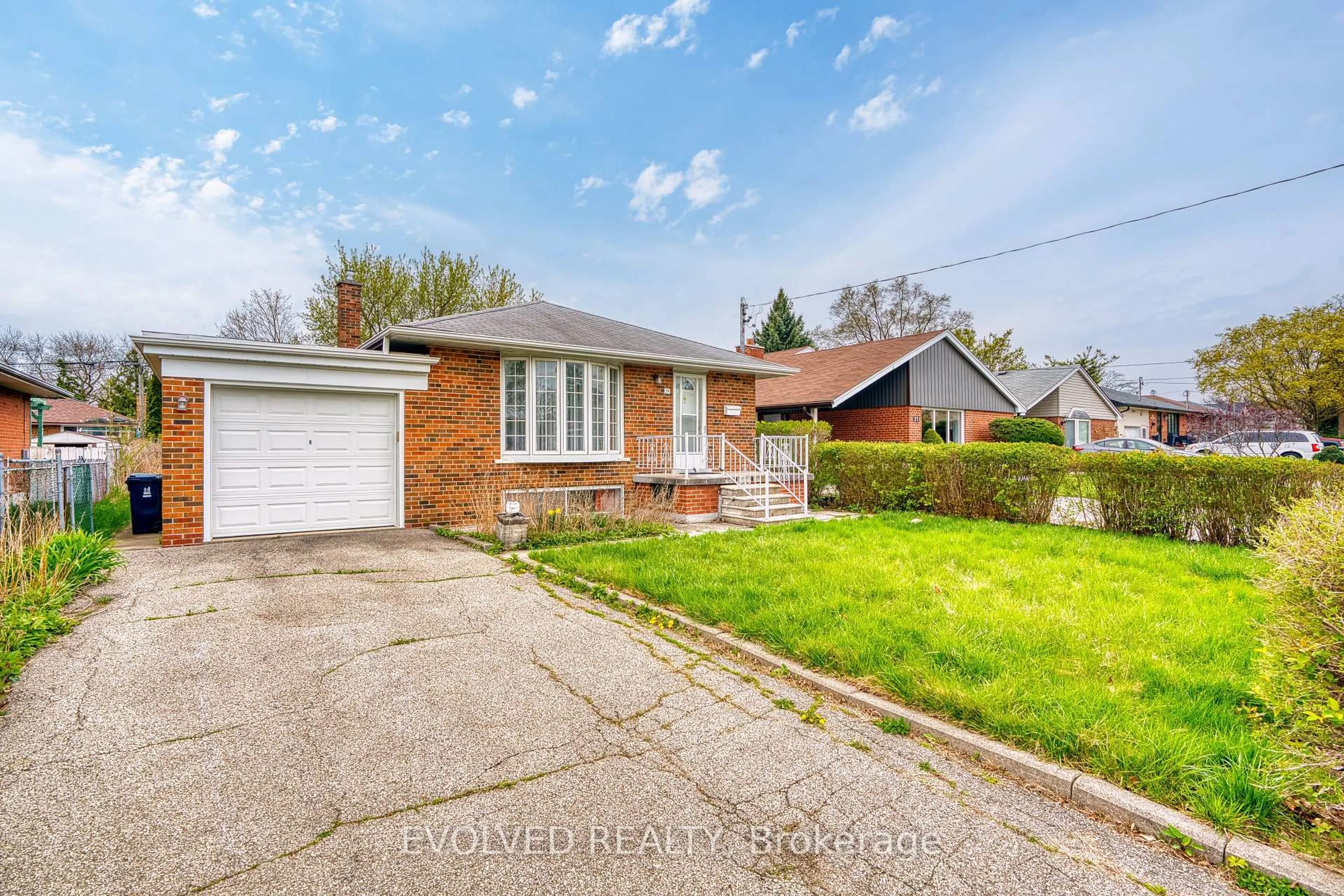 Home with brick exterior material, street for 19 Tayrow Rd, Toronto Ontario M9W 2T8