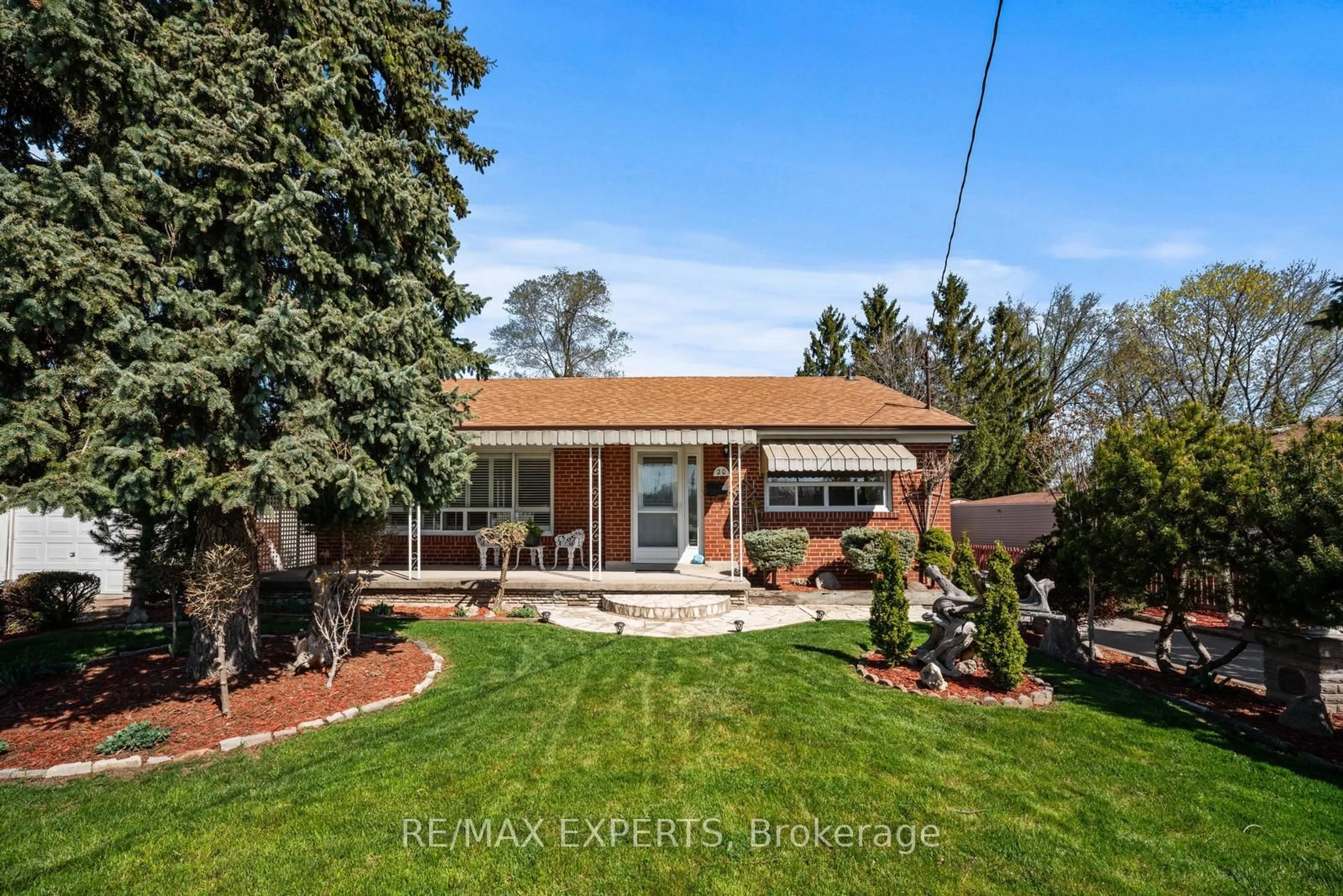 Home with brick exterior material, street for 20 Golfdown Dr, Toronto Ontario M9W 2H5