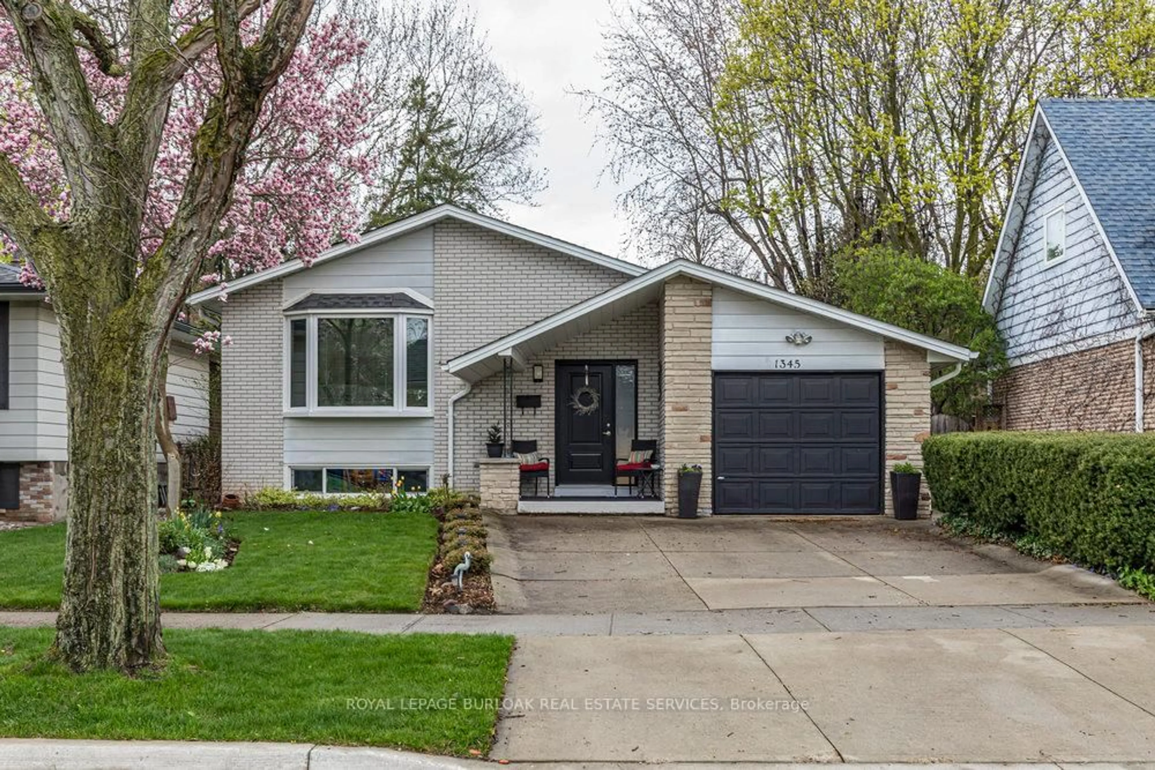 Home with vinyl exterior material, street for 1345 Ester Dr, Burlington Ontario L7P 1L2