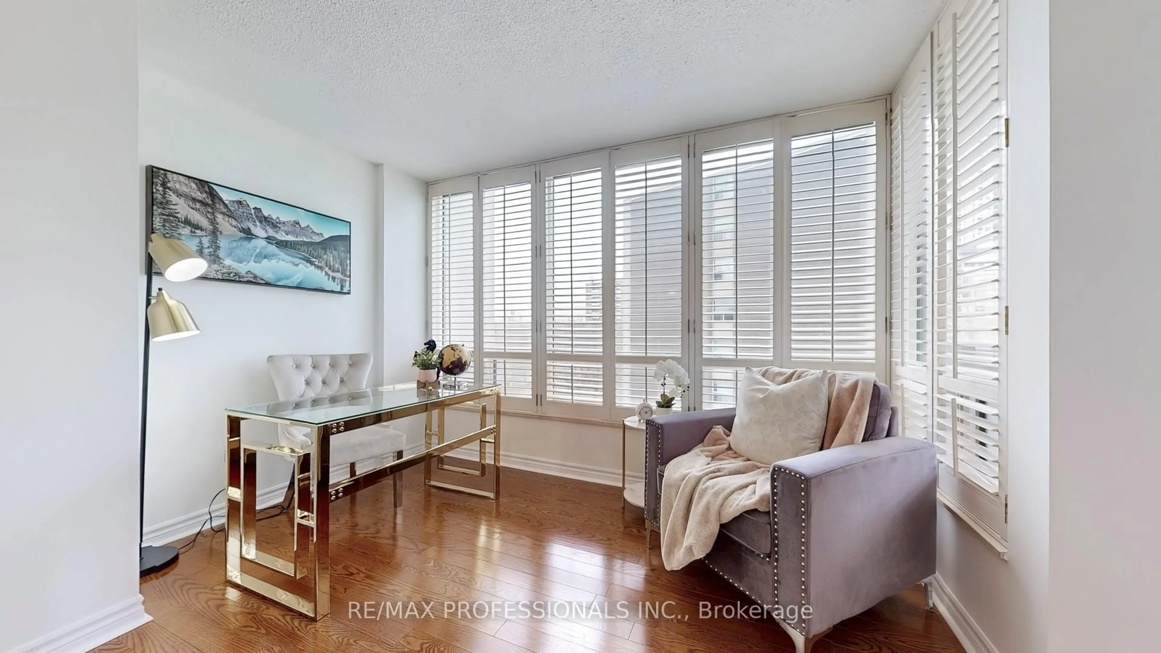 Living room with furniture, wood/laminate floor for 1300 Islington Ave #408, Toronto Ontario M9A 5C4