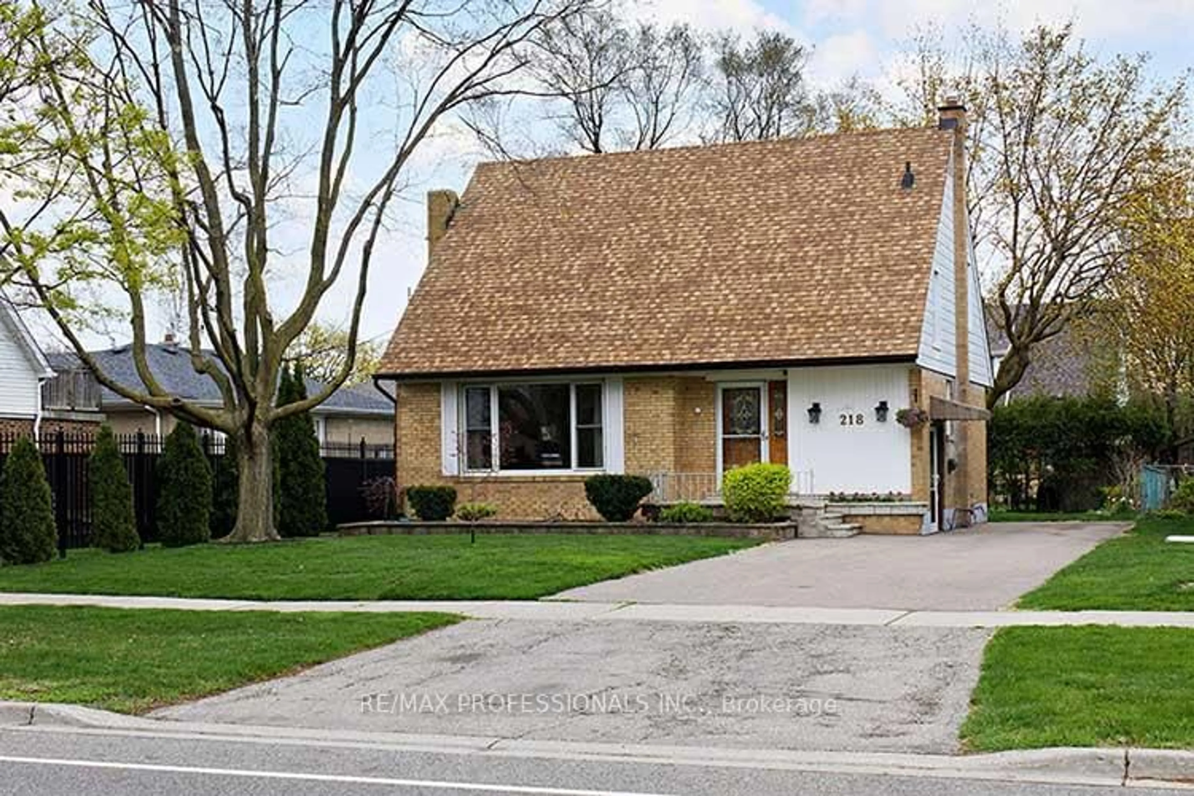 Home with brick exterior material, street for 218 Renforth Dr, Toronto Ontario M9C 2K9