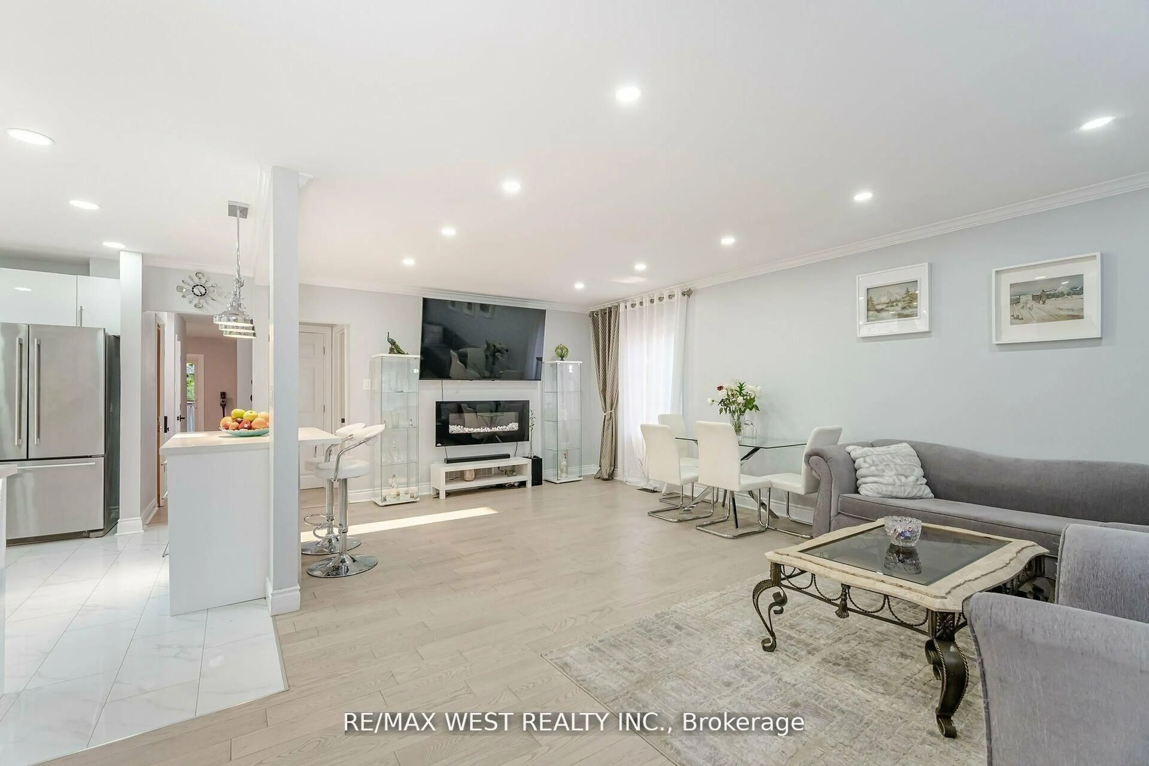 Living room with furniture, ceramic/tile floor for 12 Gordon Park Dr, Toronto Ontario M9B 1J6