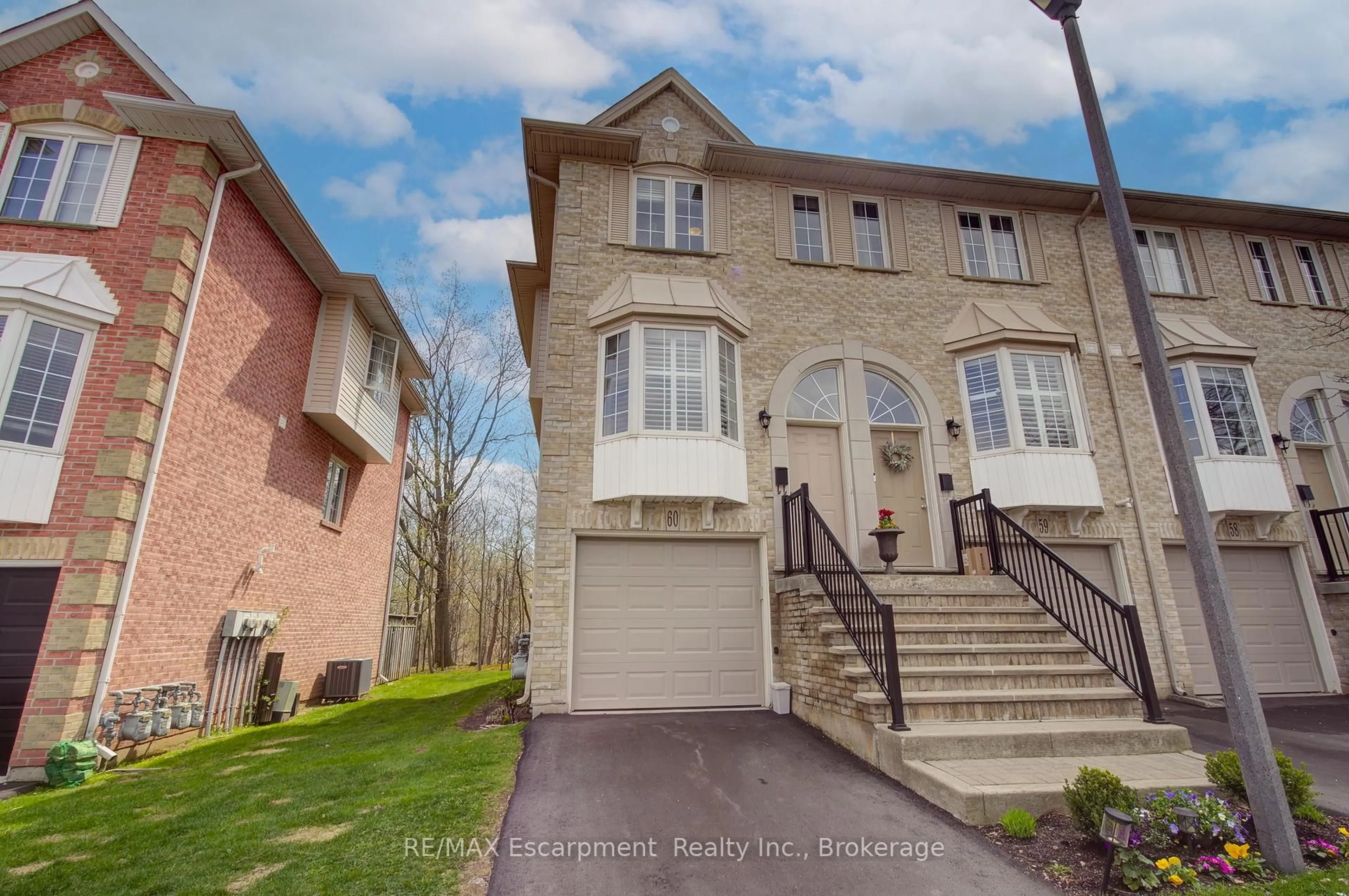 Home with brick exterior material, street for 3480 Upper Middle Rd #60, Burlington Ontario L7M 4R7