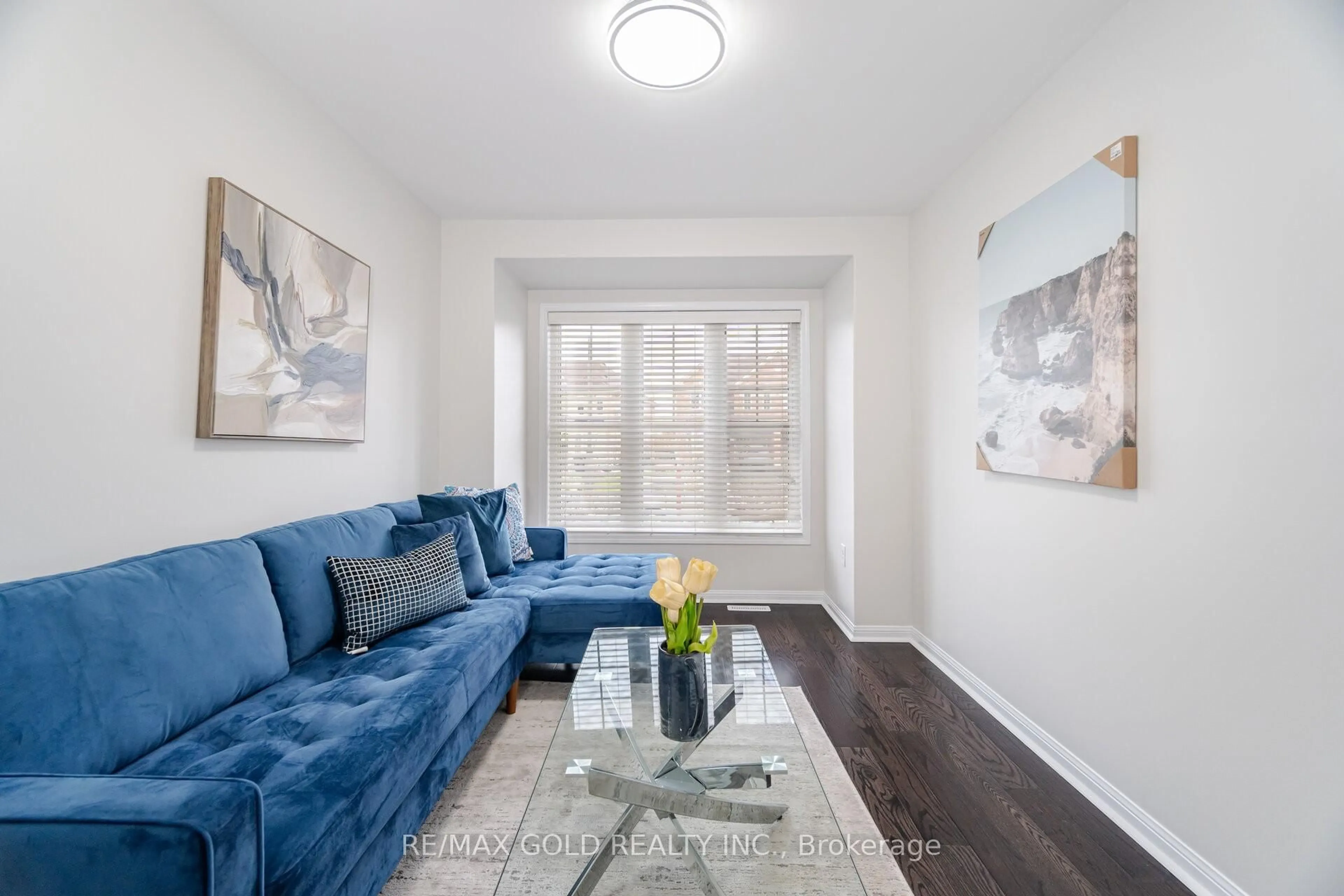 Living room with furniture, wood/laminate floor for 14 Apple Valley Way, Brampton Ontario L6P 3P8