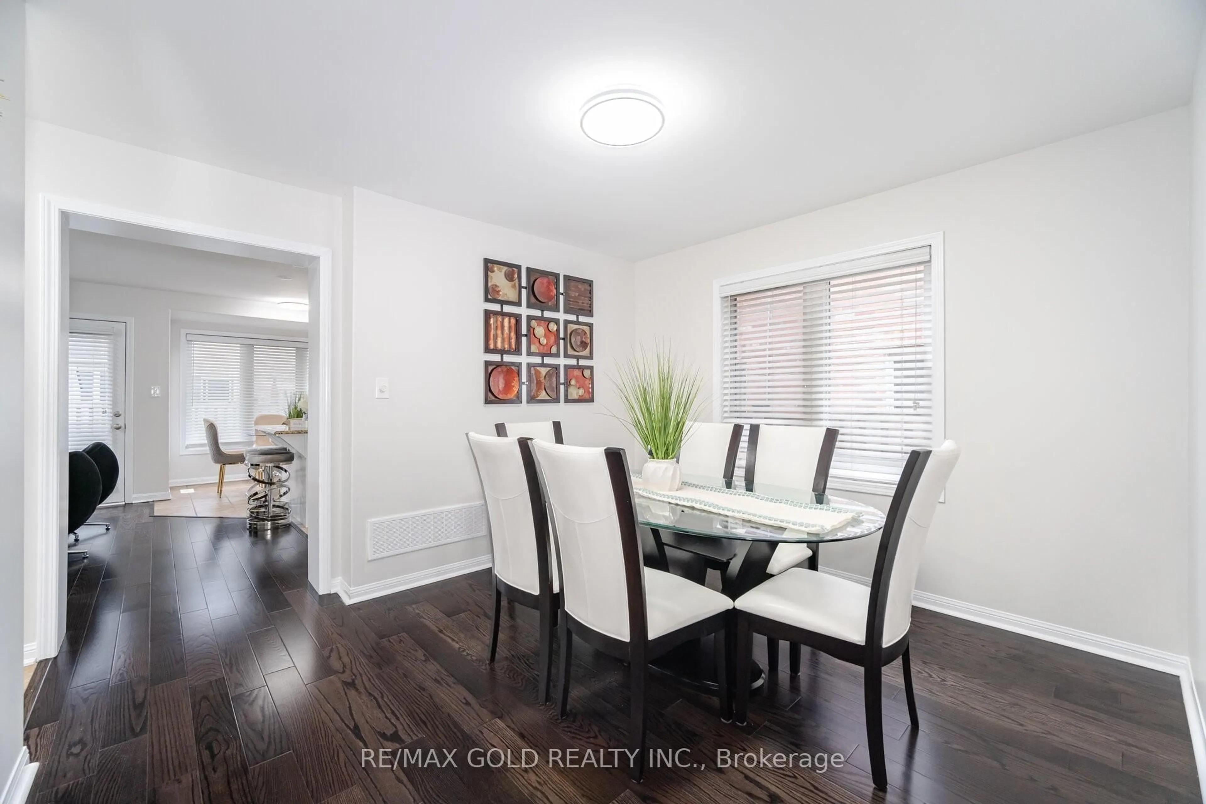 Dining room, wood/laminate floor for 14 Apple Valley Way, Brampton Ontario L6P 3P8