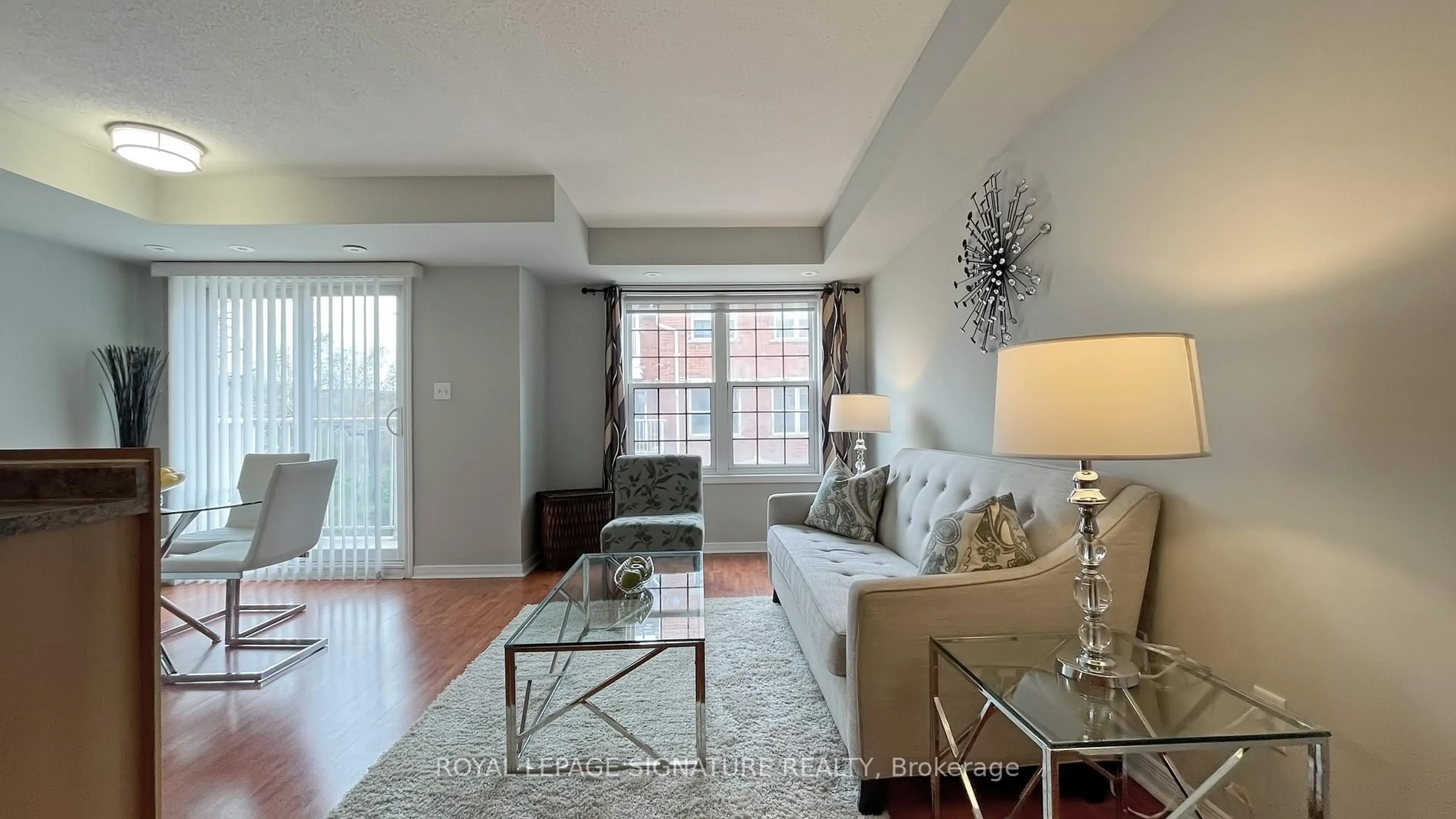 Living room with furniture, unknown for 37 Four Winds Dr #63, Toronto Ontario M3J 1K7