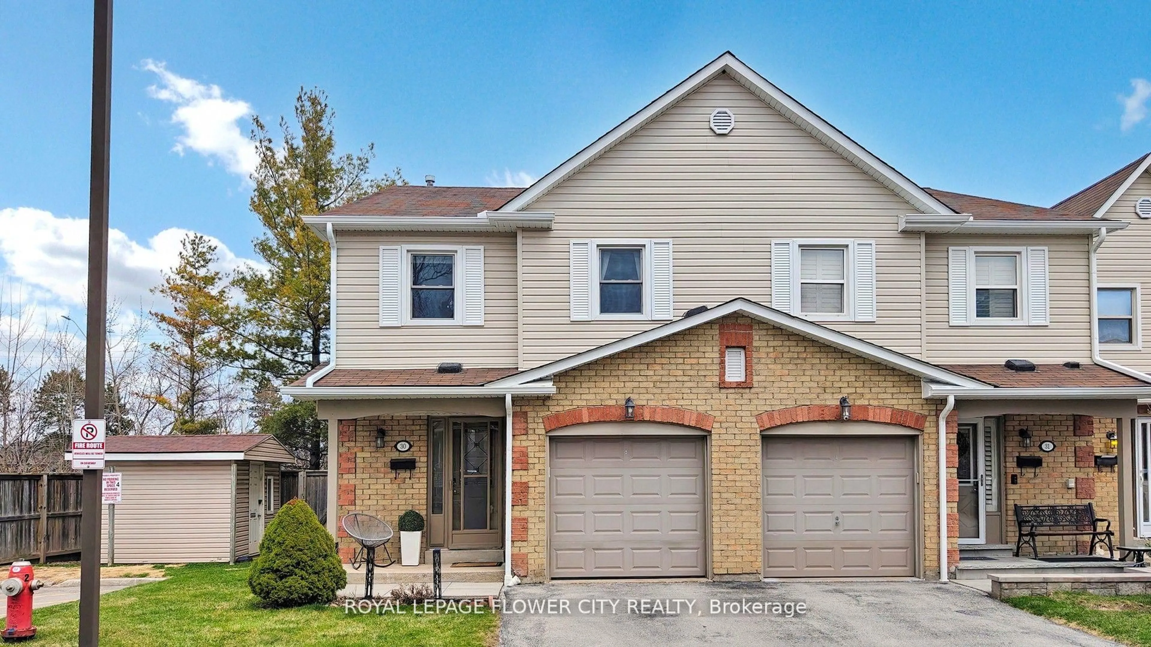 Home with brick exterior material, street for 2355 Fifth Line #30, Mississauga Ontario L5K 2M8