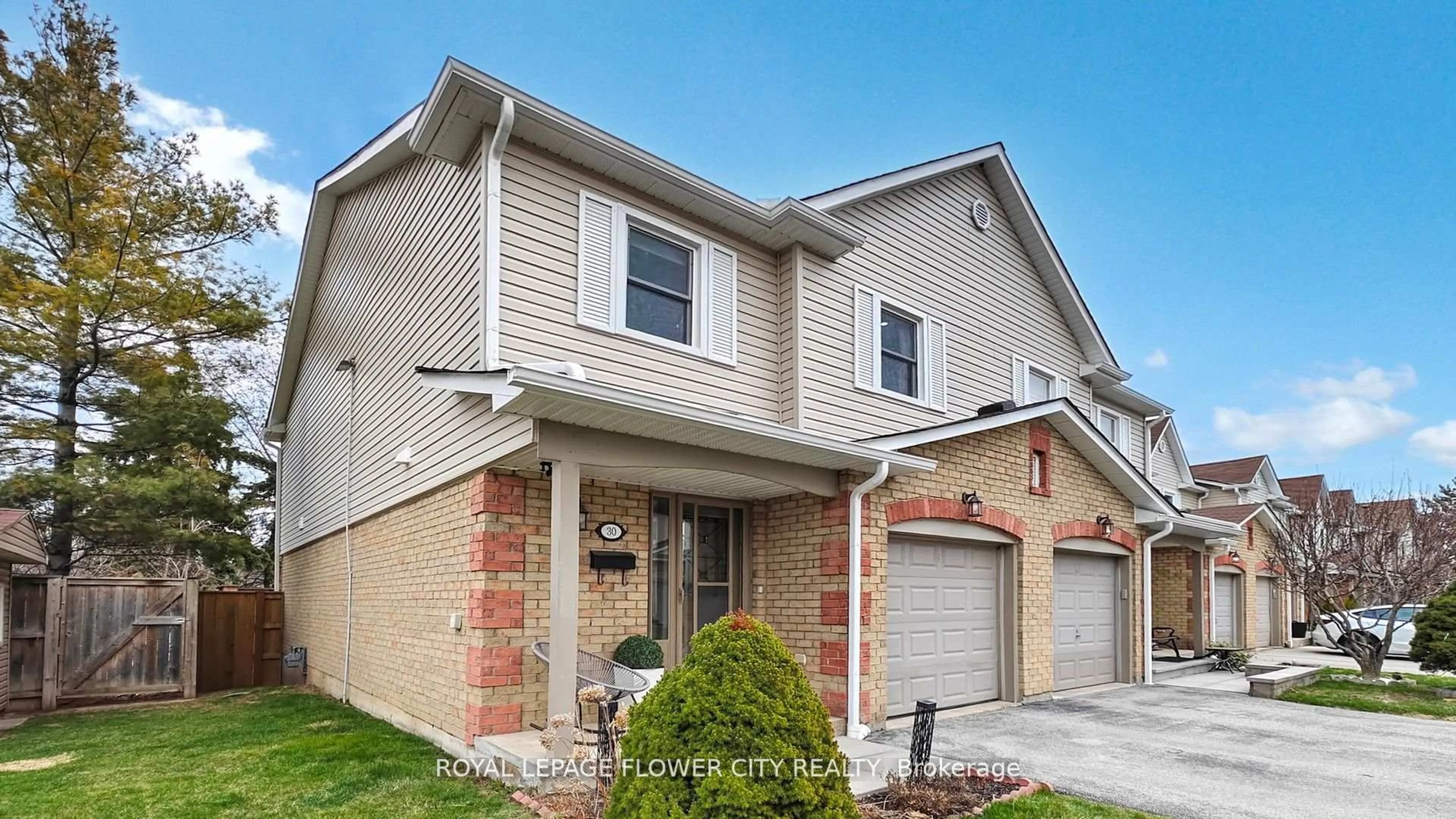 Home with brick exterior material, street for 2355 Fifth Line #30, Mississauga Ontario L5K 2M8