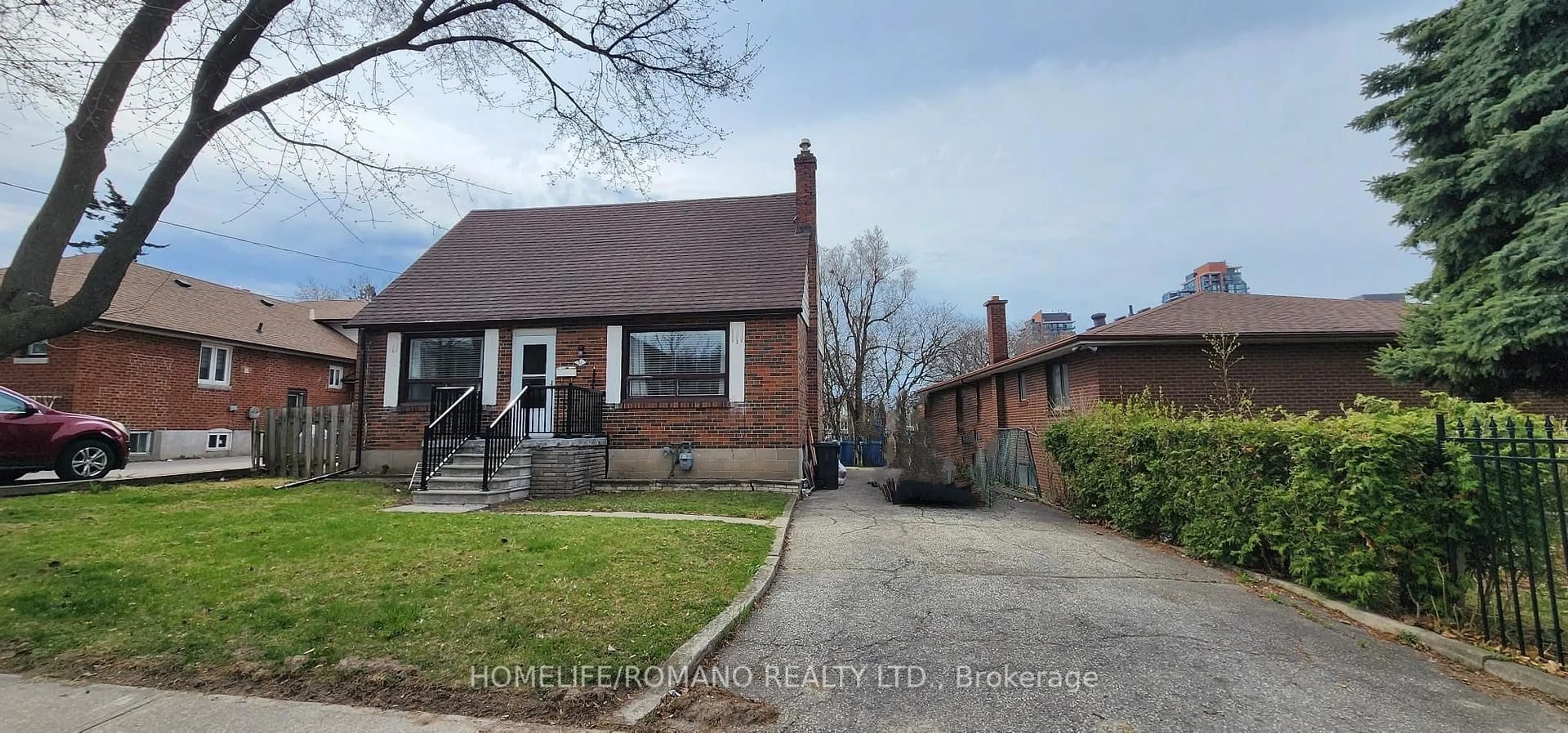 Home with brick exterior material, street for 31 Celt Ave, Toronto Ontario M6A 1H1