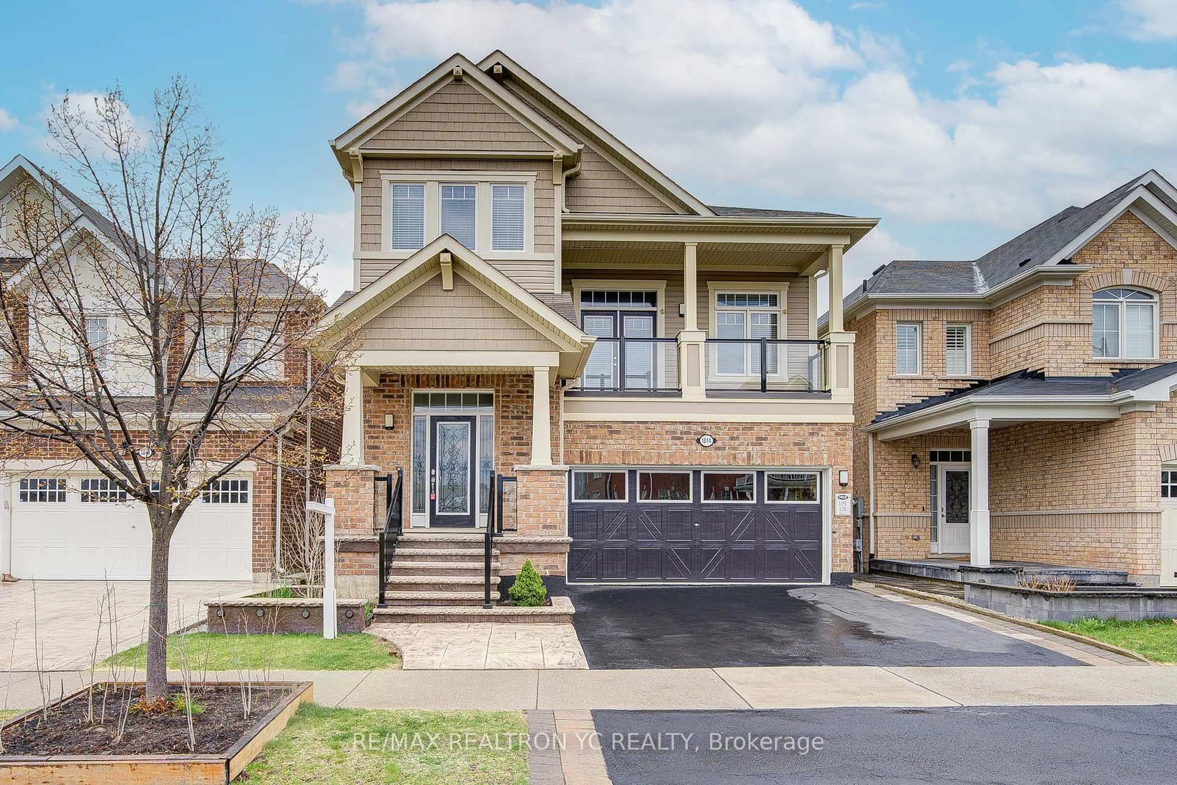 Home with brick exterior material, street for 1014 Biason Circ, Milton Ontario L9T 8S9
