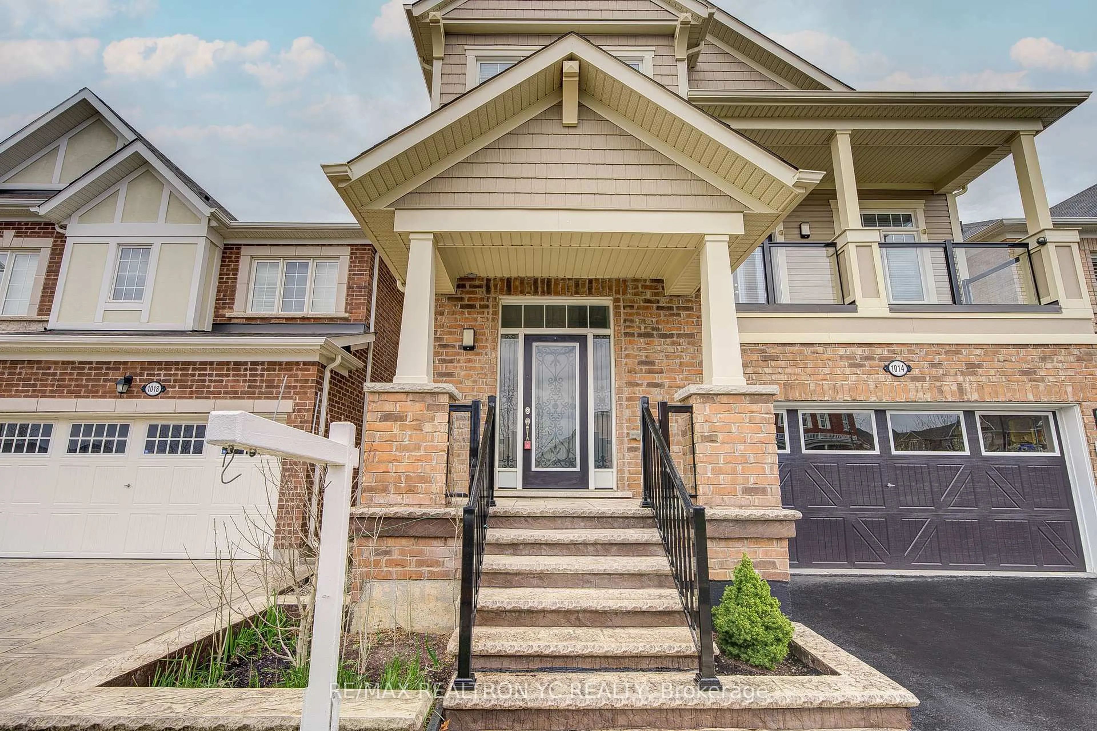 Home with brick exterior material, street for 1014 Biason Circ, Milton Ontario L9T 8S9