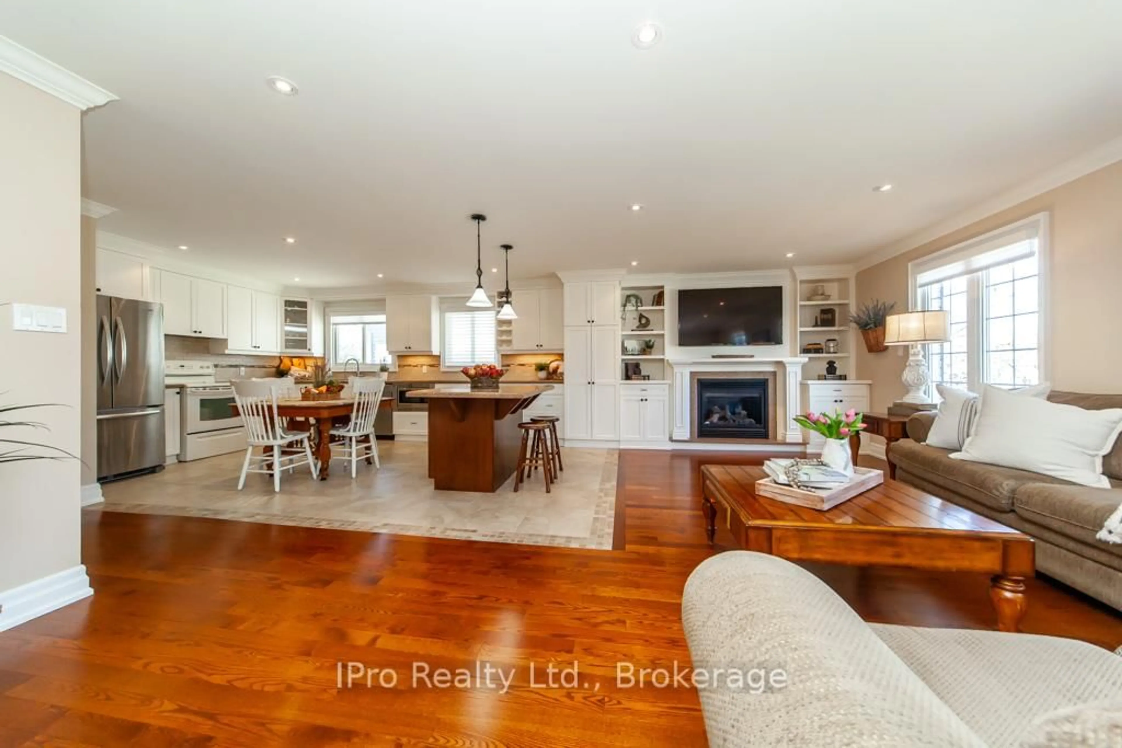 Open concept kitchen, wood/laminate floor for 874 Pearen Ave, Milton Ontario L9T 4Y3