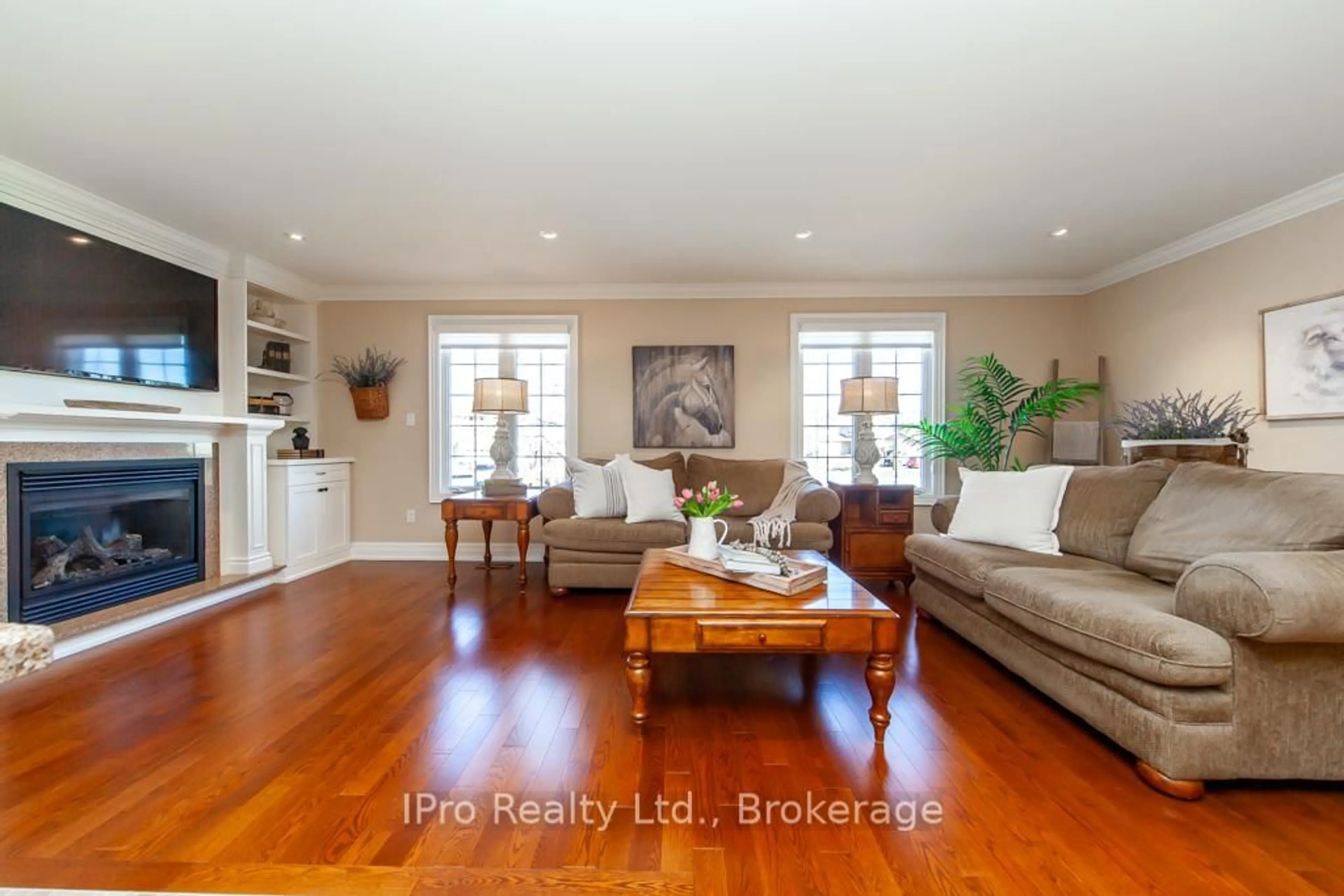 Living room with furniture, wood/laminate floor for 874 Pearen Ave, Milton Ontario L9T 4Y3