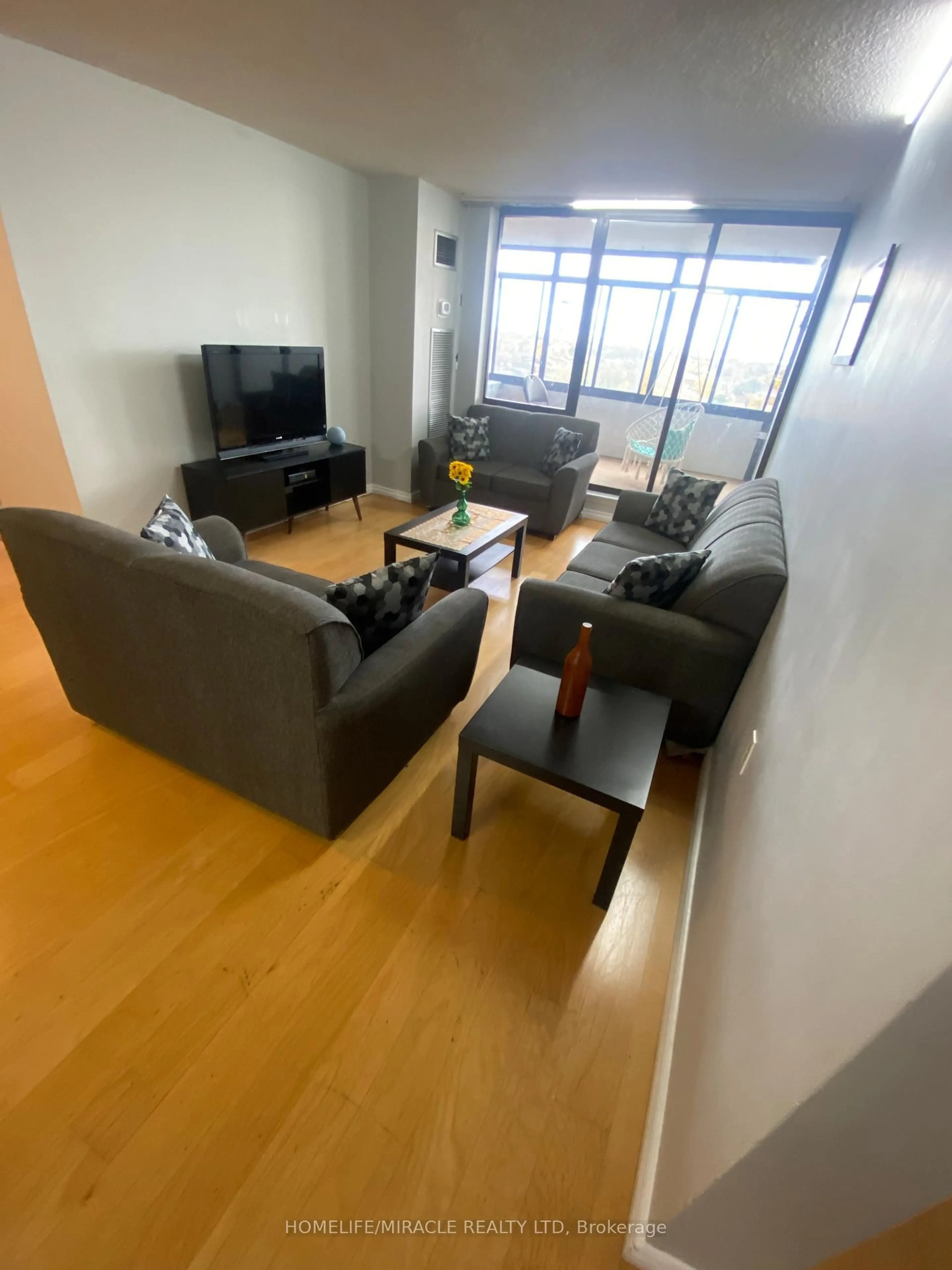 Living room with furniture, unknown for 18 Knightsbridge Rd #903, Brampton Ontario L6T 3X5