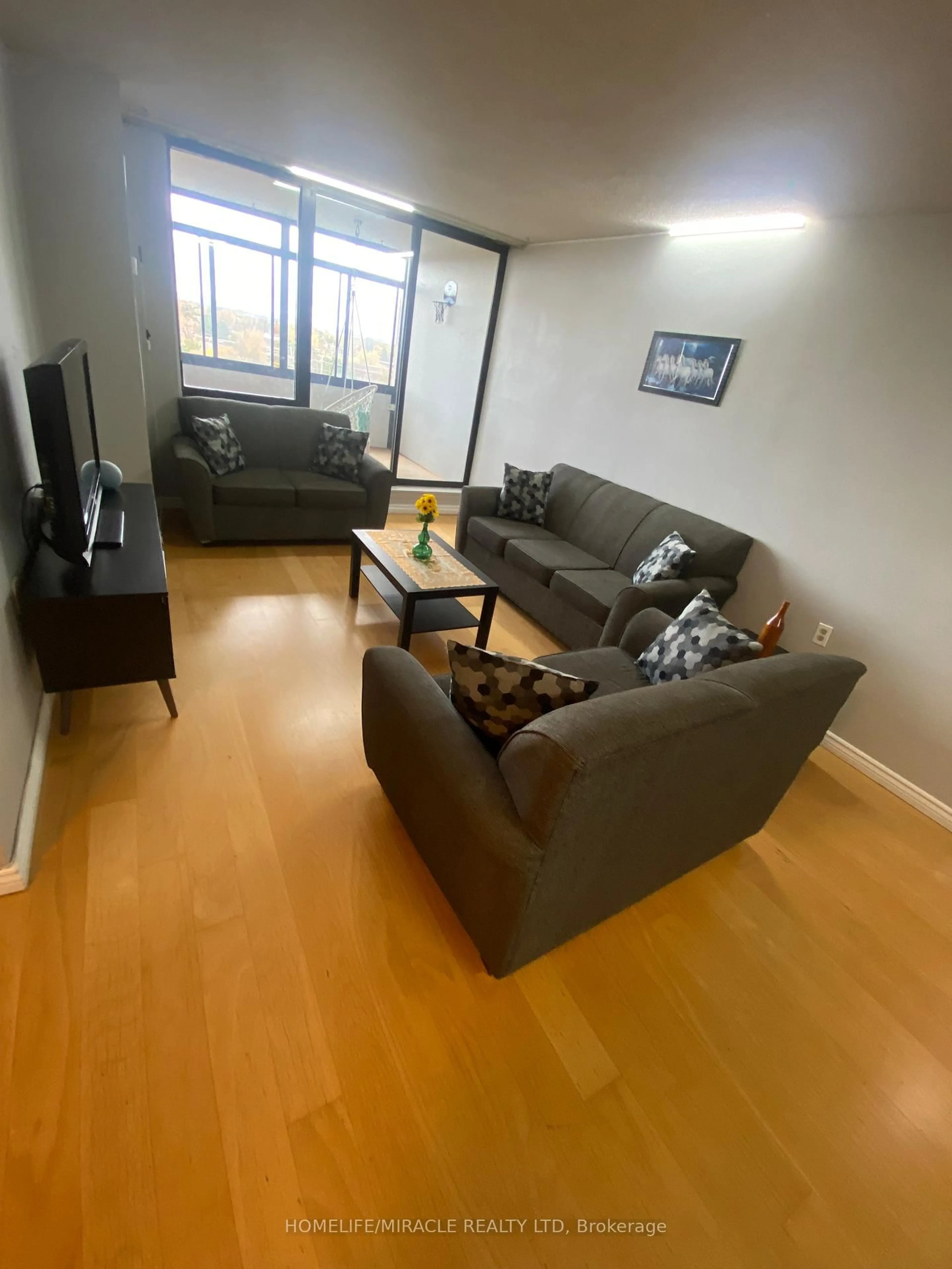 Living room with furniture, unknown for 18 Knightsbridge Rd #903, Brampton Ontario L6T 3X5