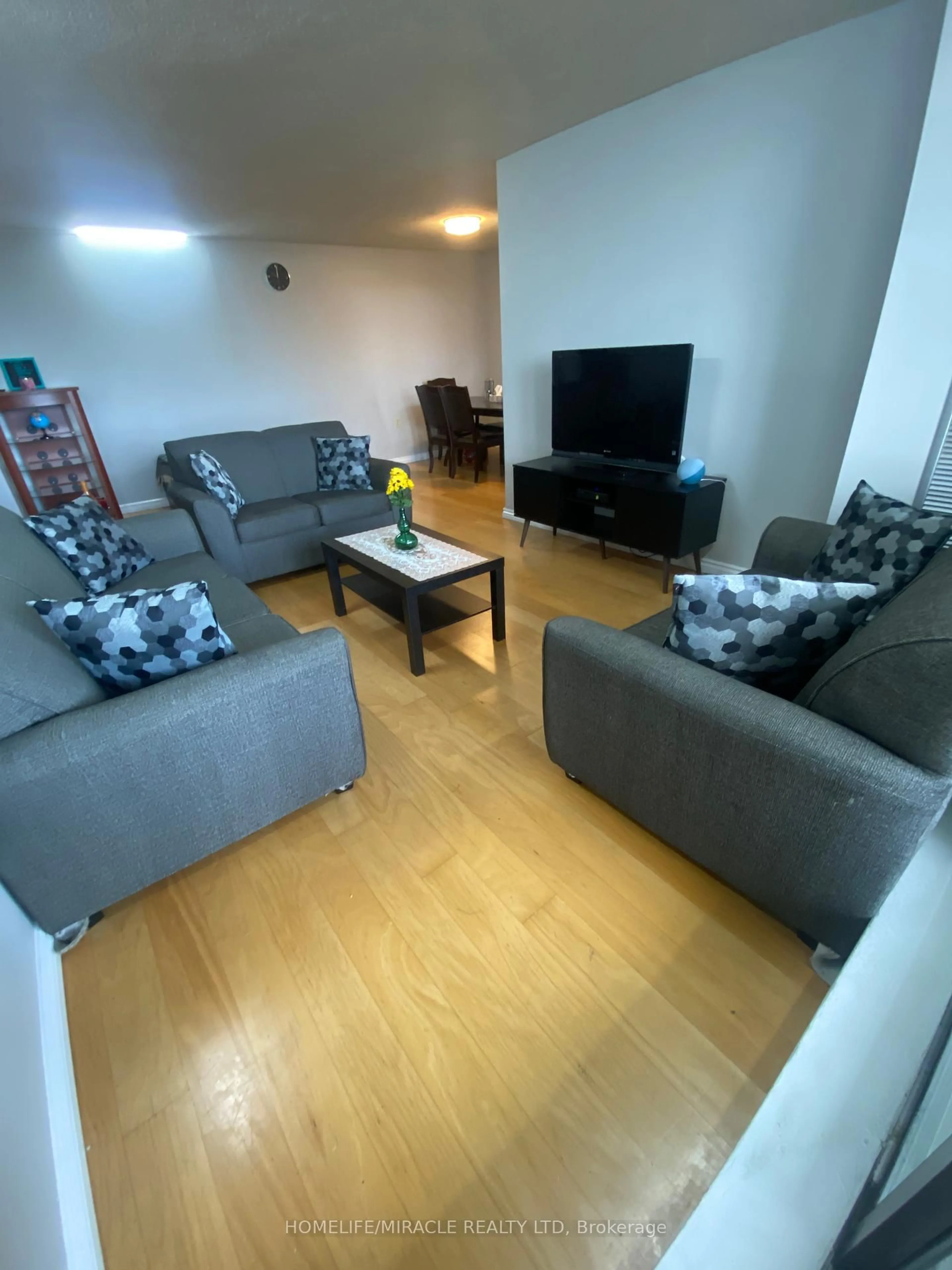 Living room with furniture, unknown for 18 Knightsbridge Rd #903, Brampton Ontario L6T 3X5
