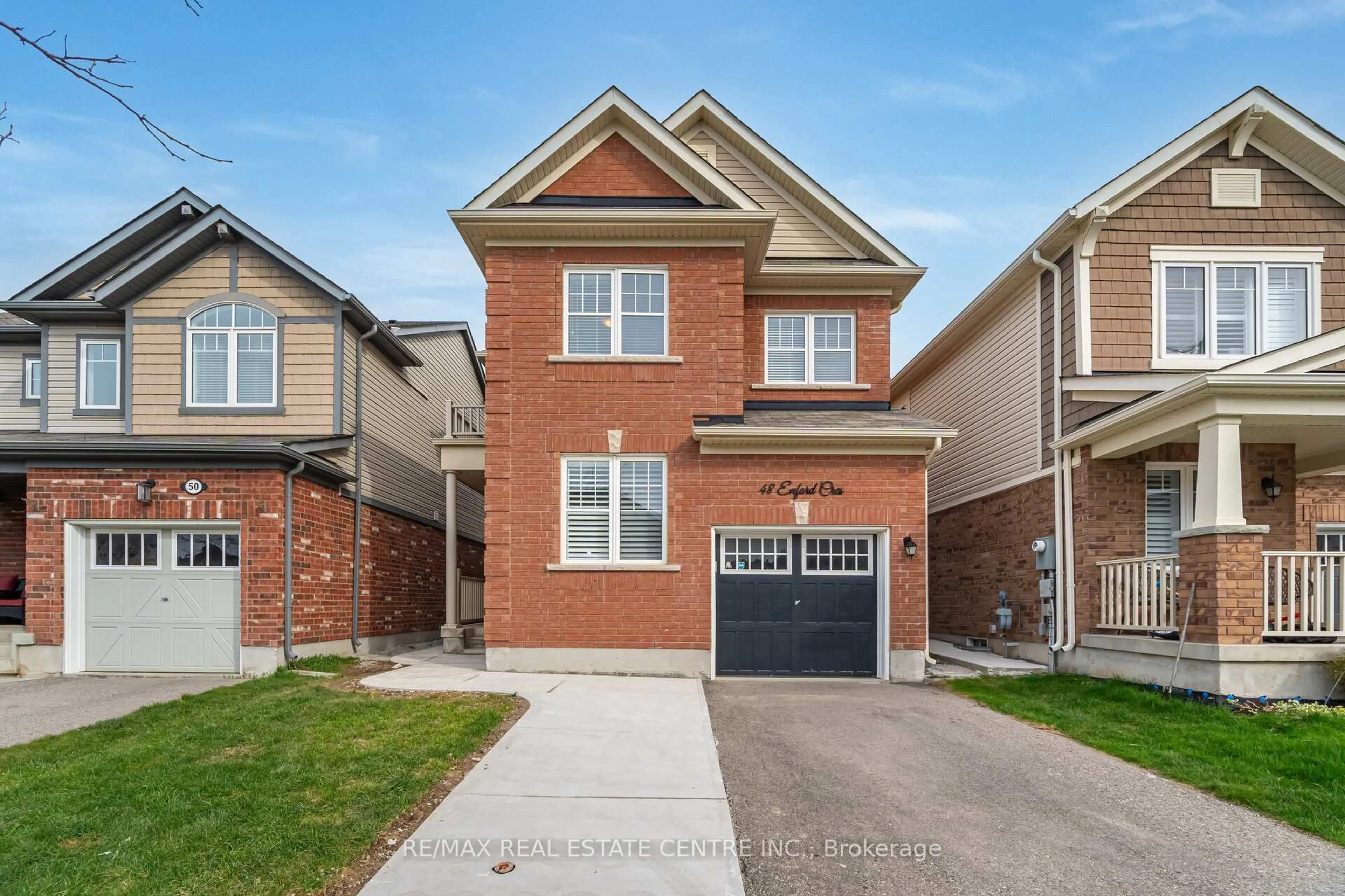 Home with brick exterior material, street for 48 Enford Cres, Brampton Ontario L7A 4C7