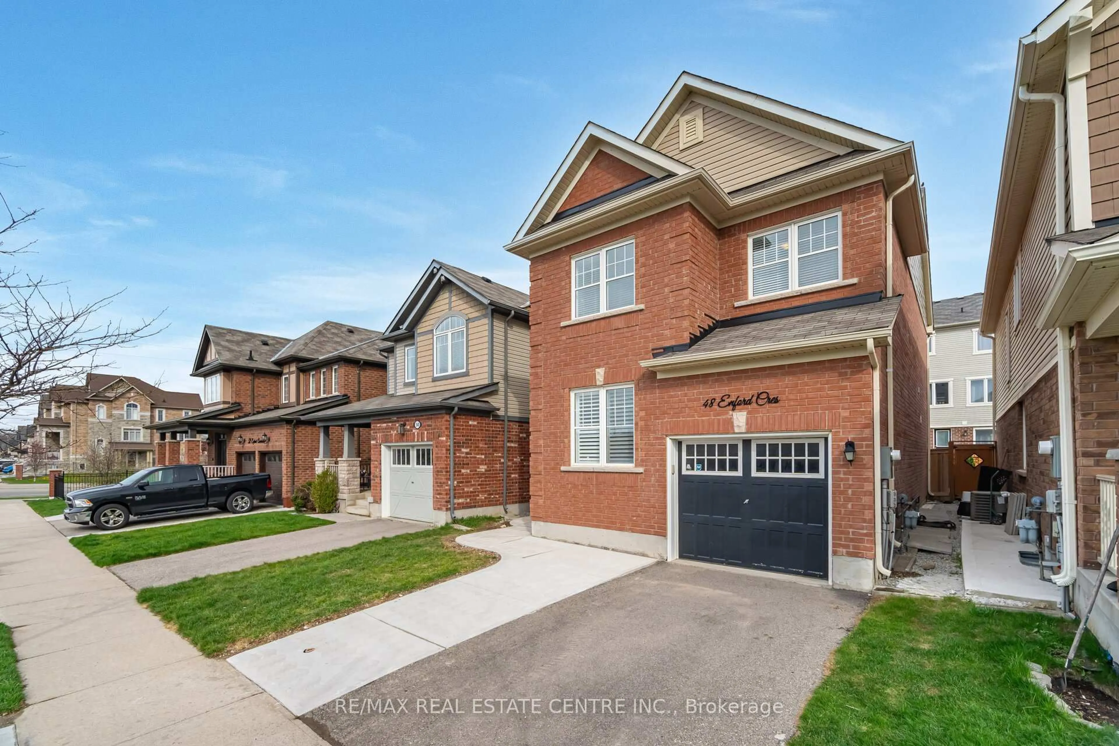 Home with brick exterior material, street for 48 Enford Cres, Brampton Ontario L7A 4C7