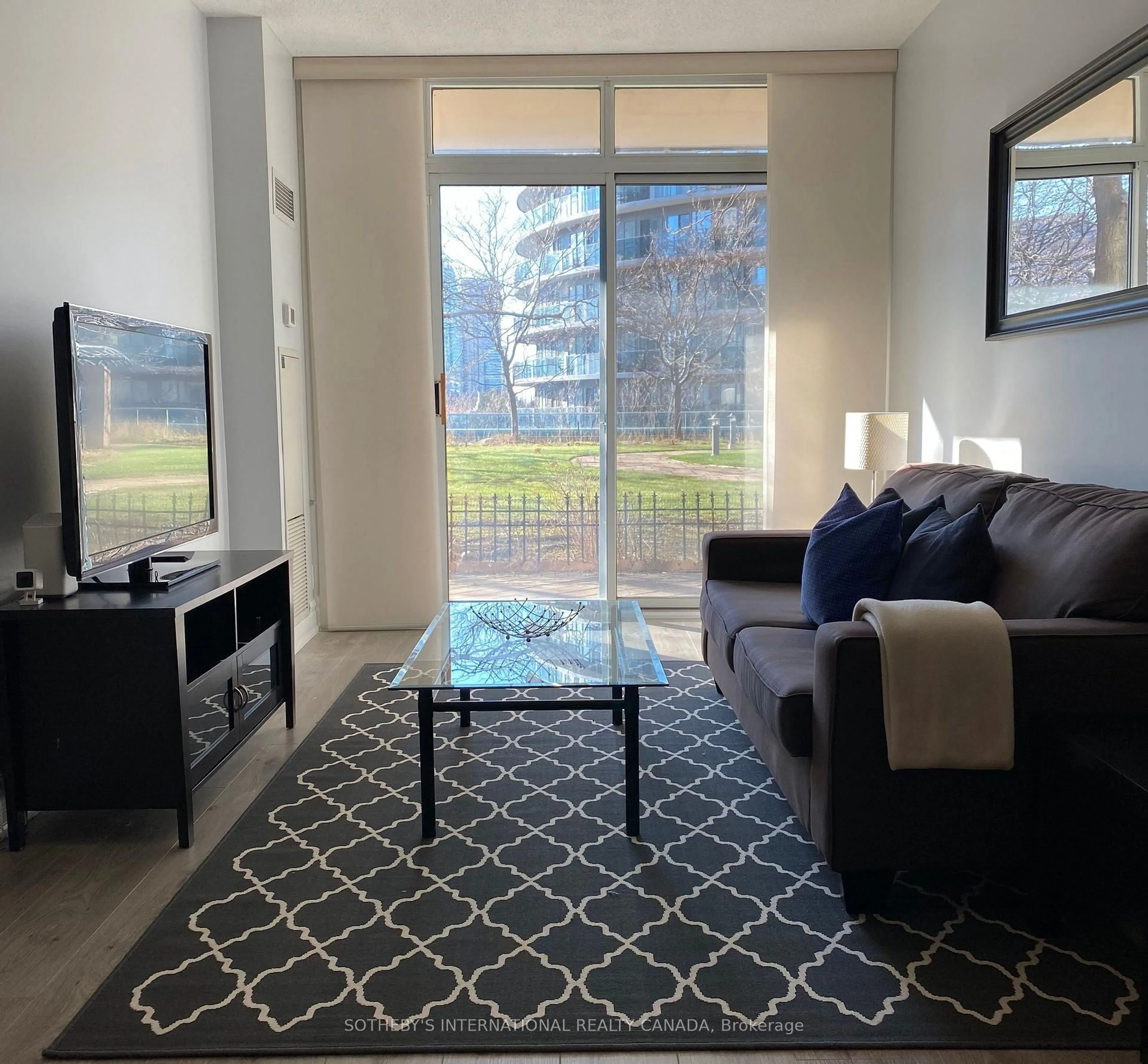 Living room with furniture, unknown for 70 Absolute Ave #306, Mississauga Ontario L4Z 0A4