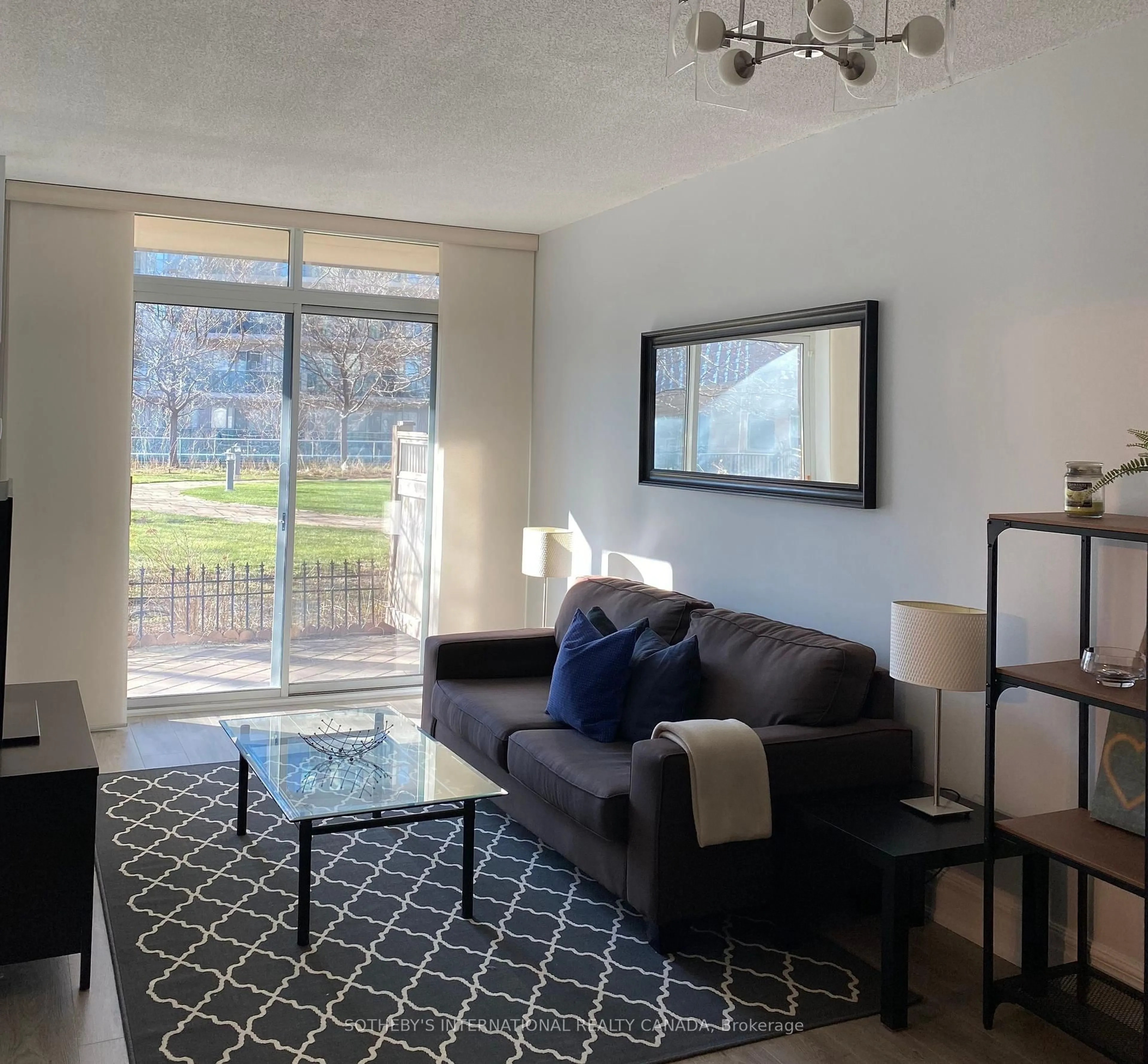 Living room with furniture, unknown for 70 Absolute Ave #306, Mississauga Ontario L4Z 0A4