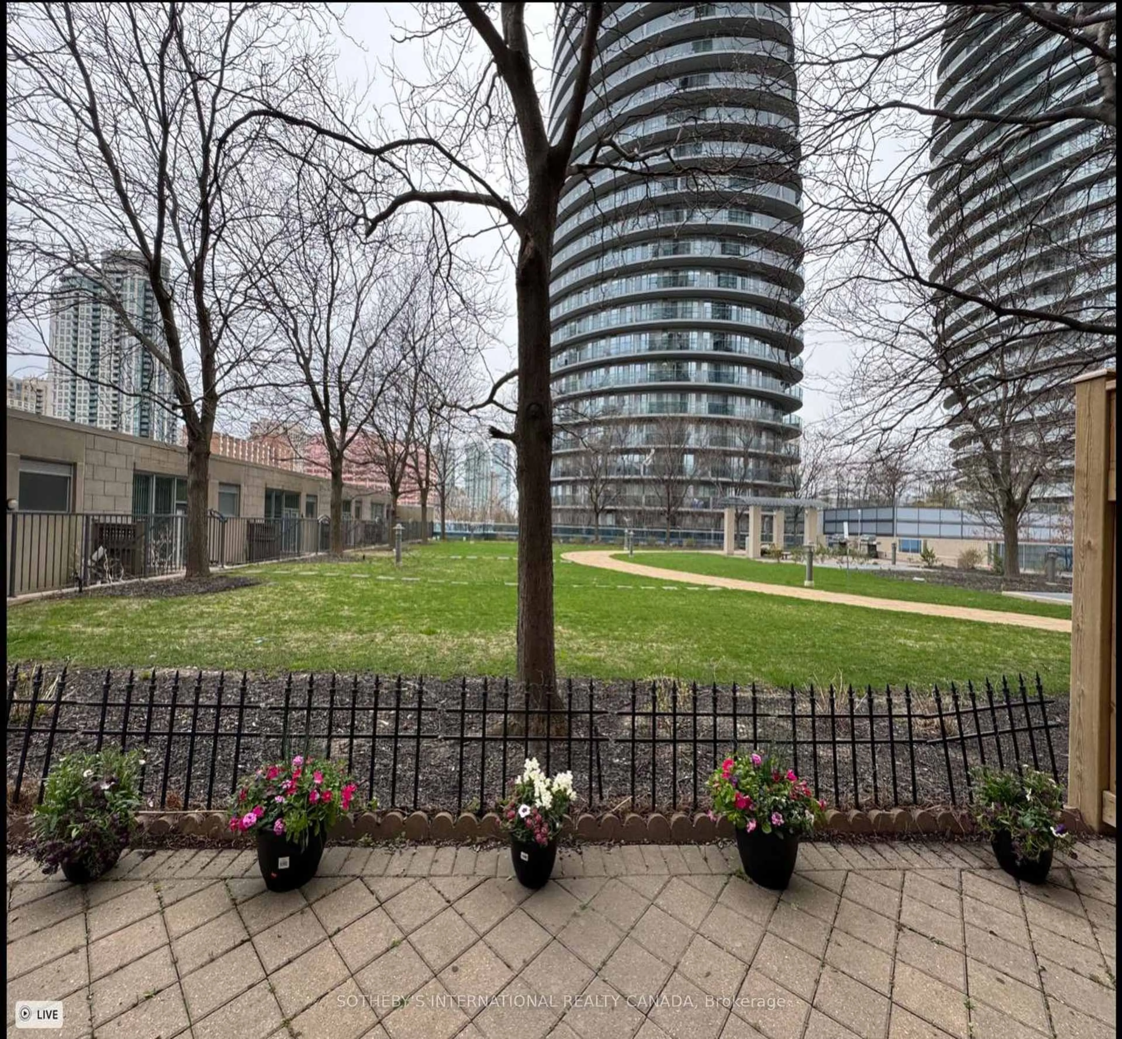 Patio, city buildings view from balcony for 70 Absolute Ave #306, Mississauga Ontario L4Z 0A4