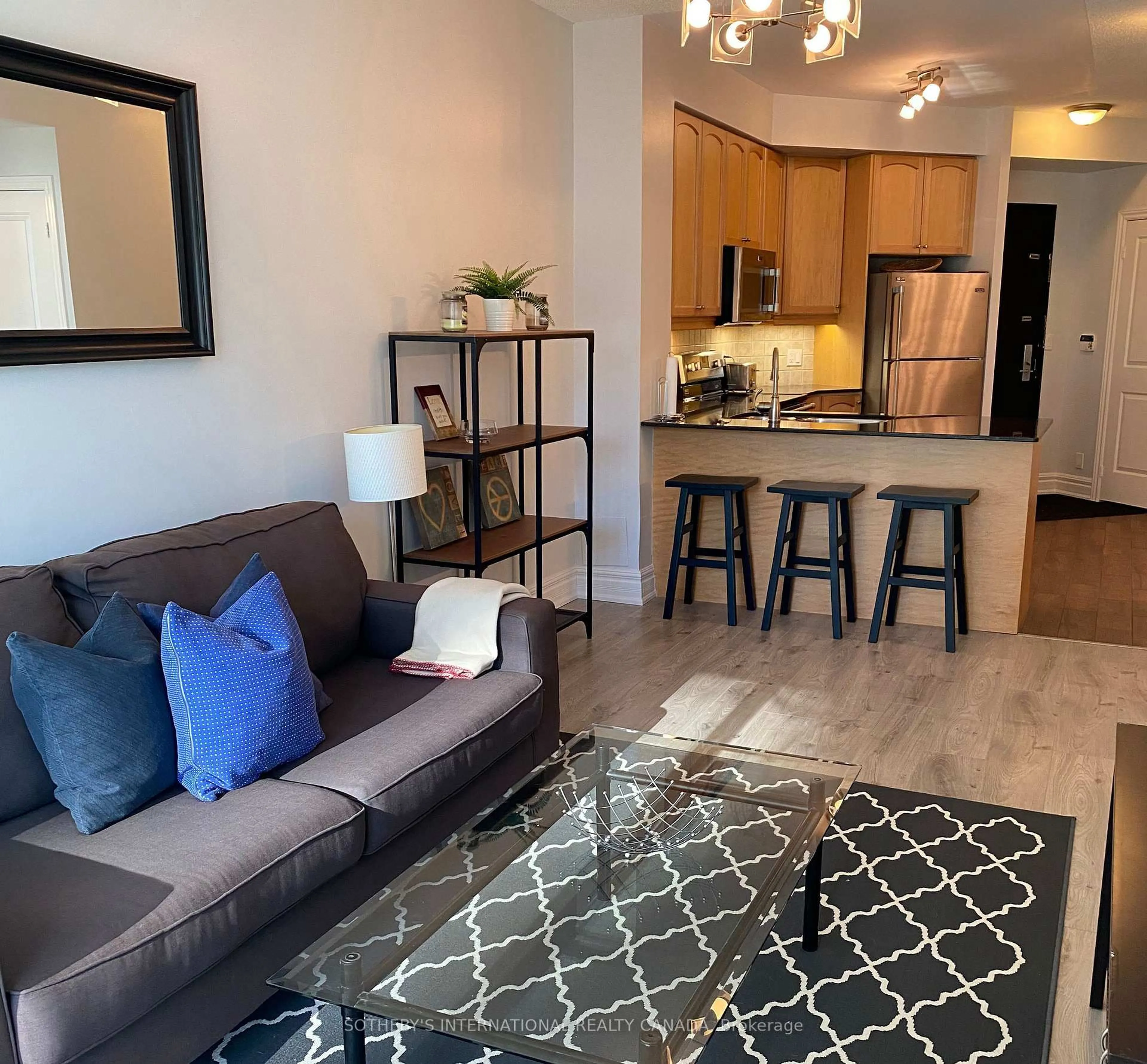 Living room with furniture, unknown for 70 Absolute Ave #306, Mississauga Ontario L4Z 0A4