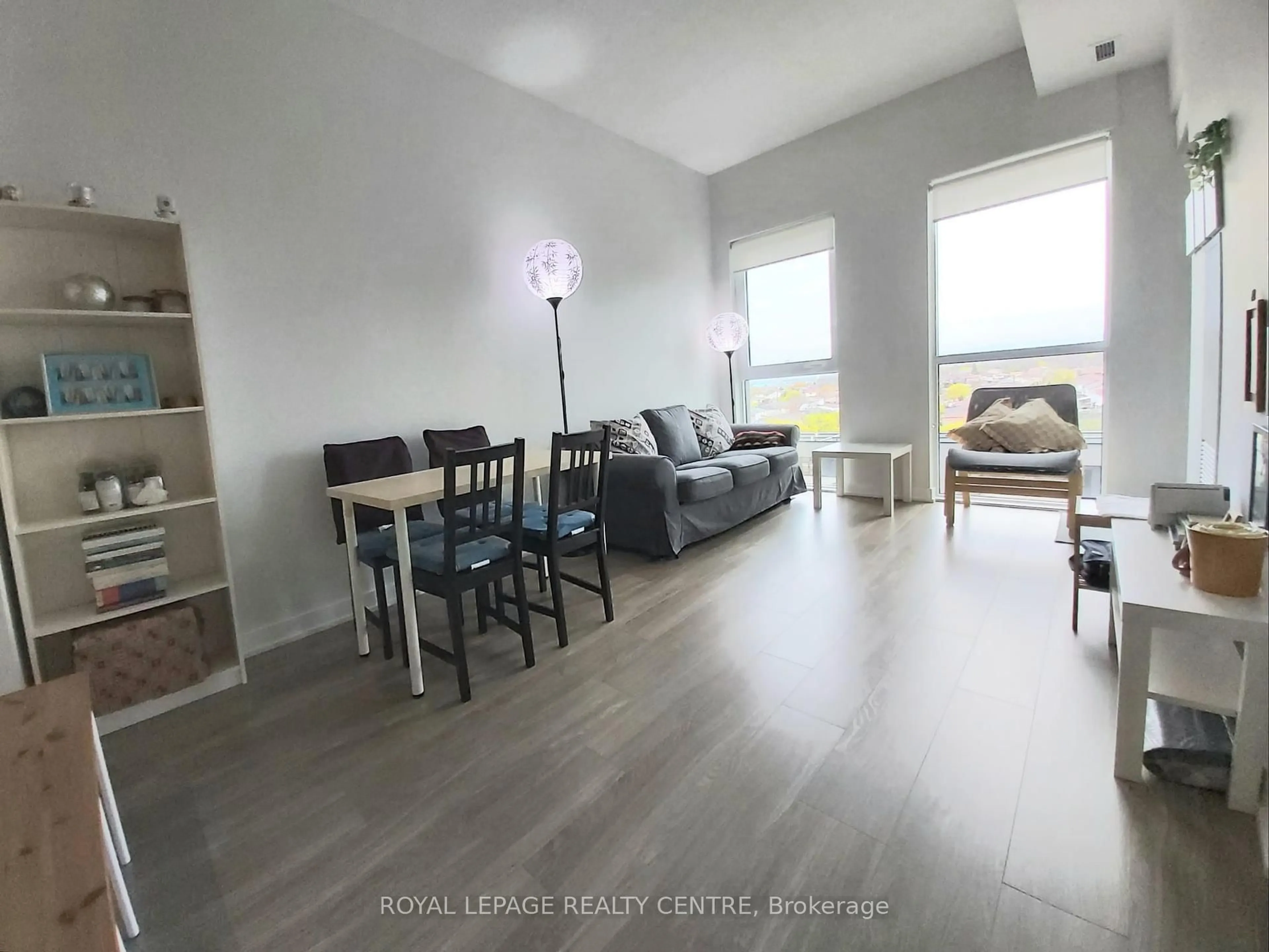 Living room with furniture, wood/laminate floor for 4055 Parkside Village Dr #627, Mississauga Ontario L5B 0K8